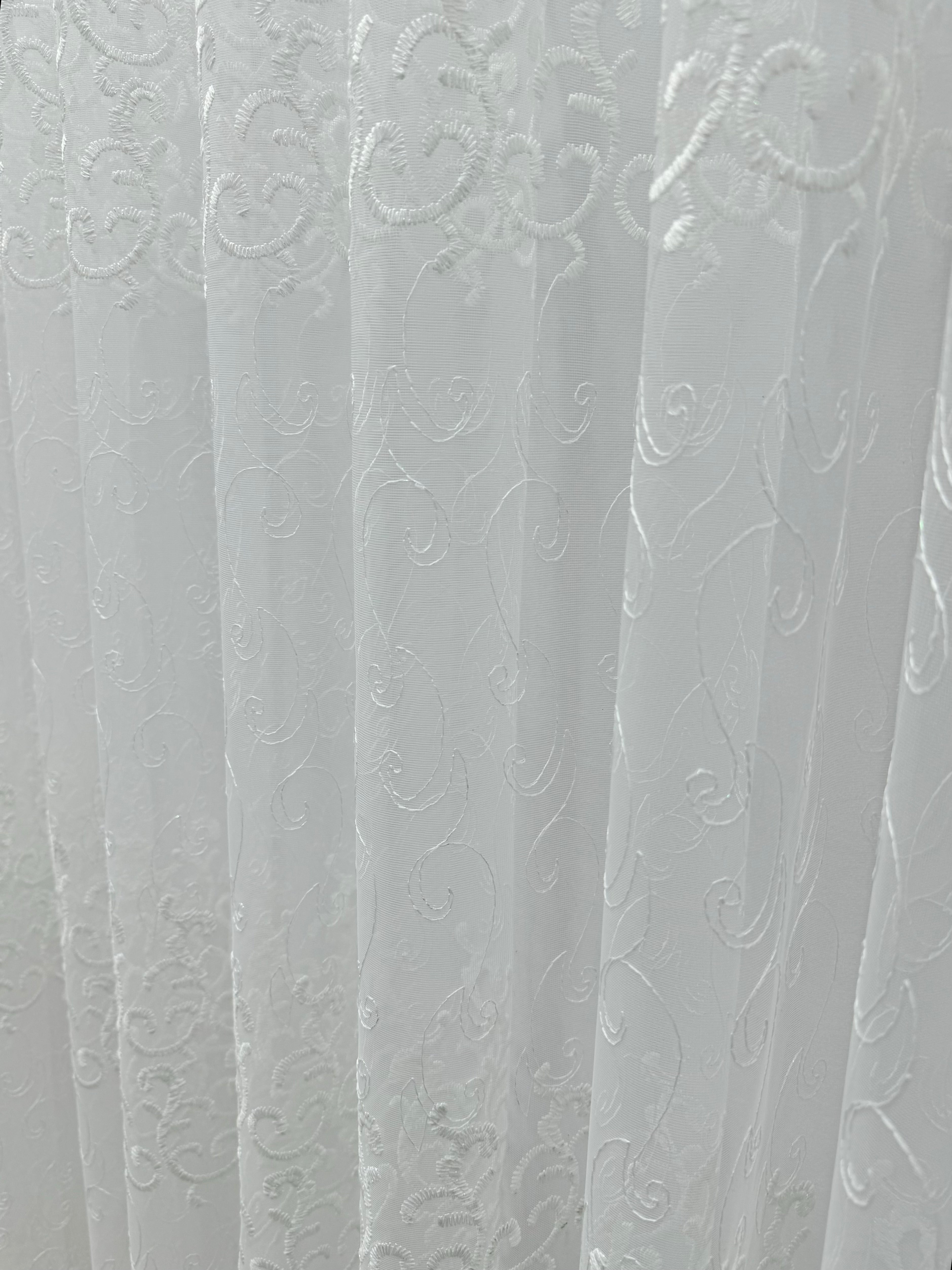Sheer curtain based on tulle with beautiful embroidery, white color