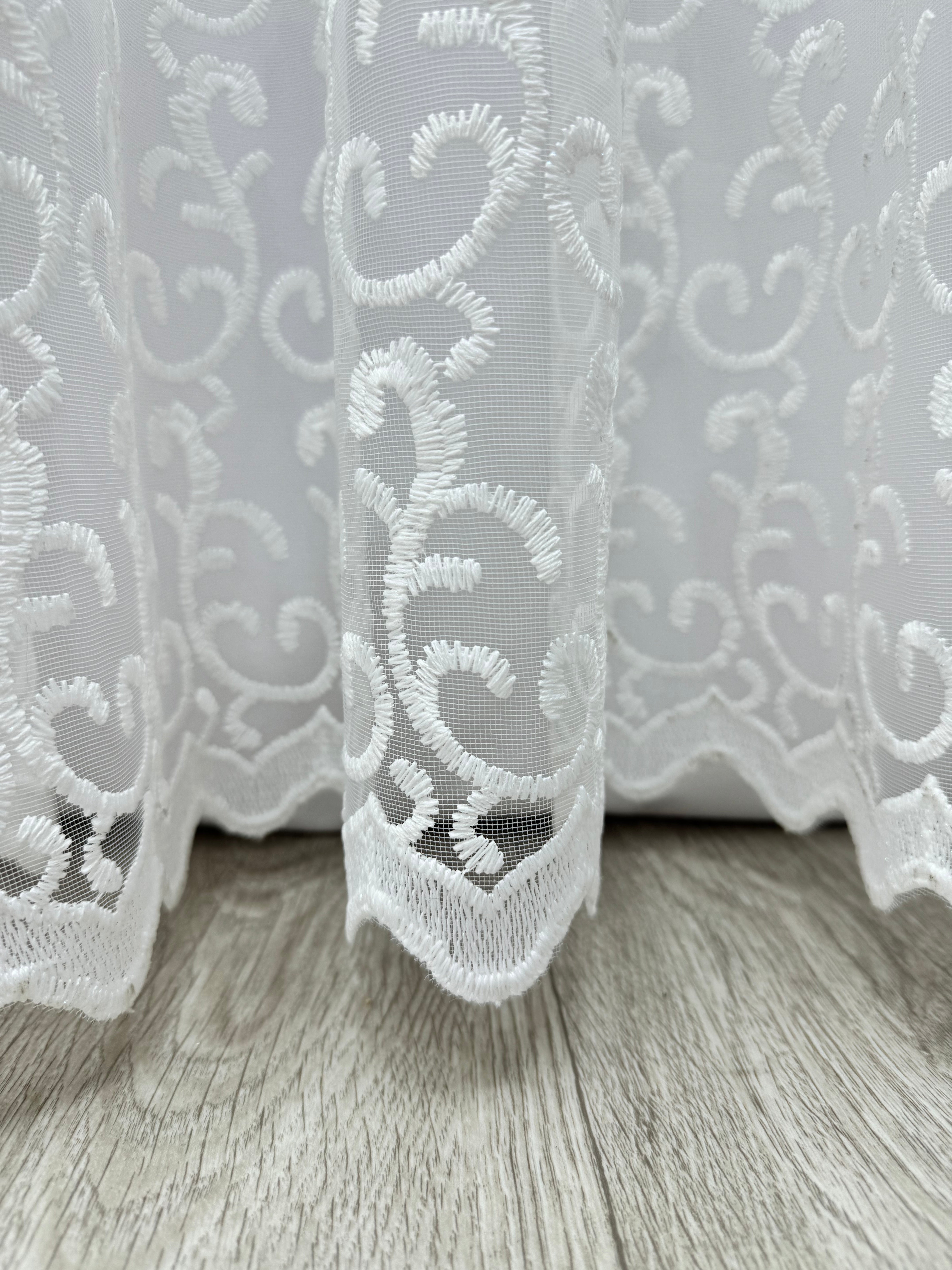 Sheer curtain based on tulle with beautiful embroidery, white color
