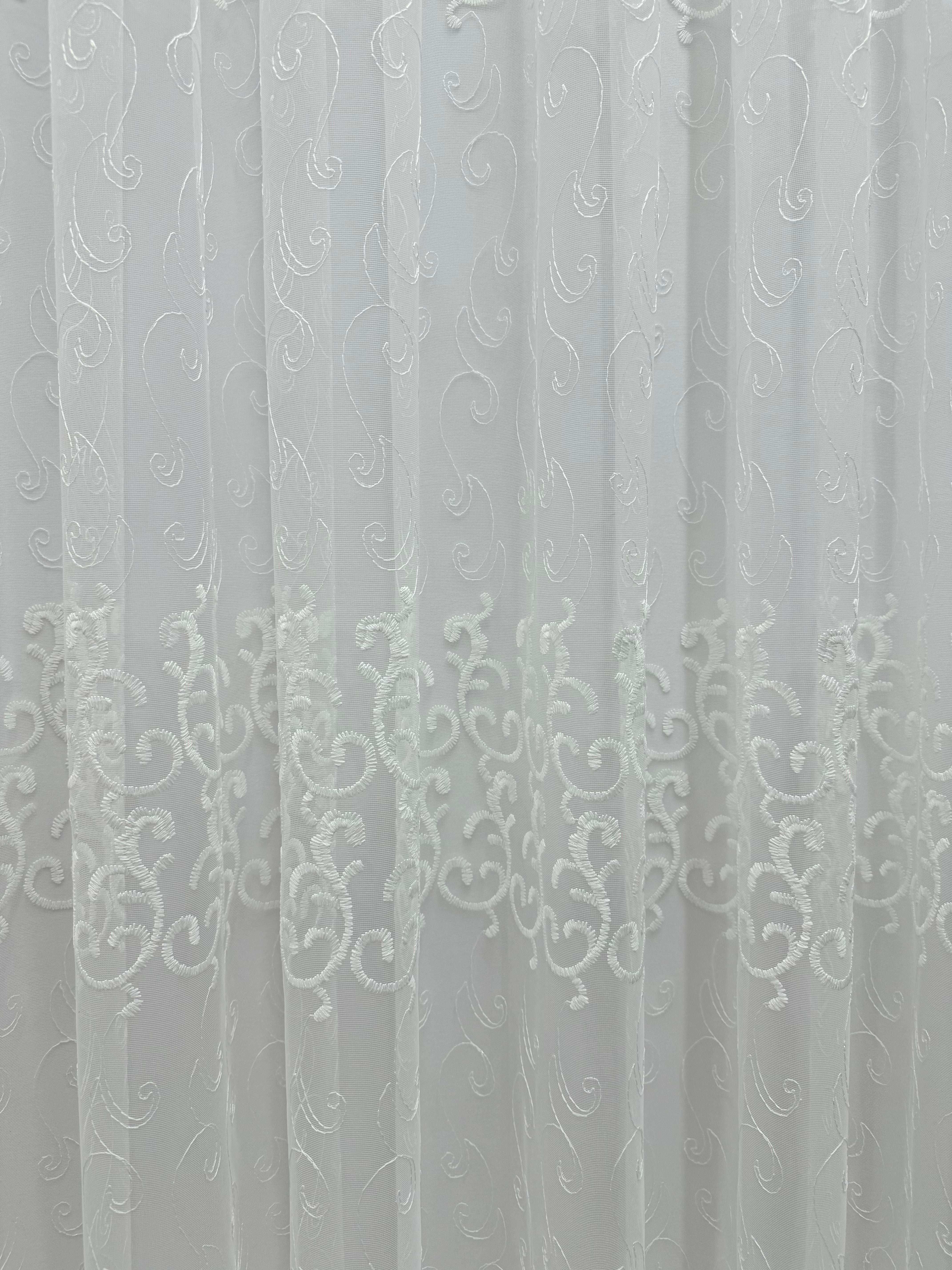 Sheer curtain based on tulle with beautiful embroidery, white color