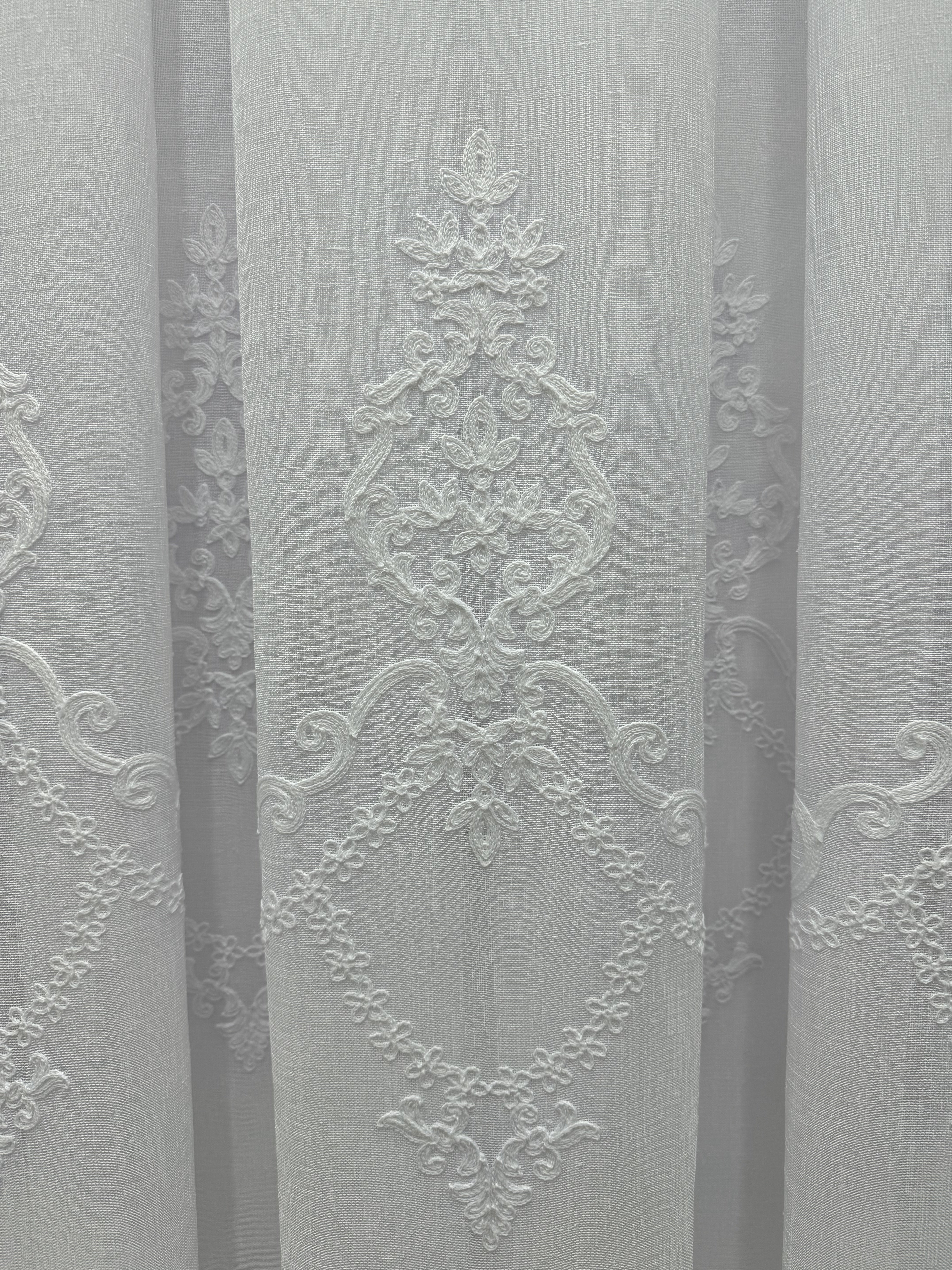 Linen-based sheer curtain with embroidery, white color