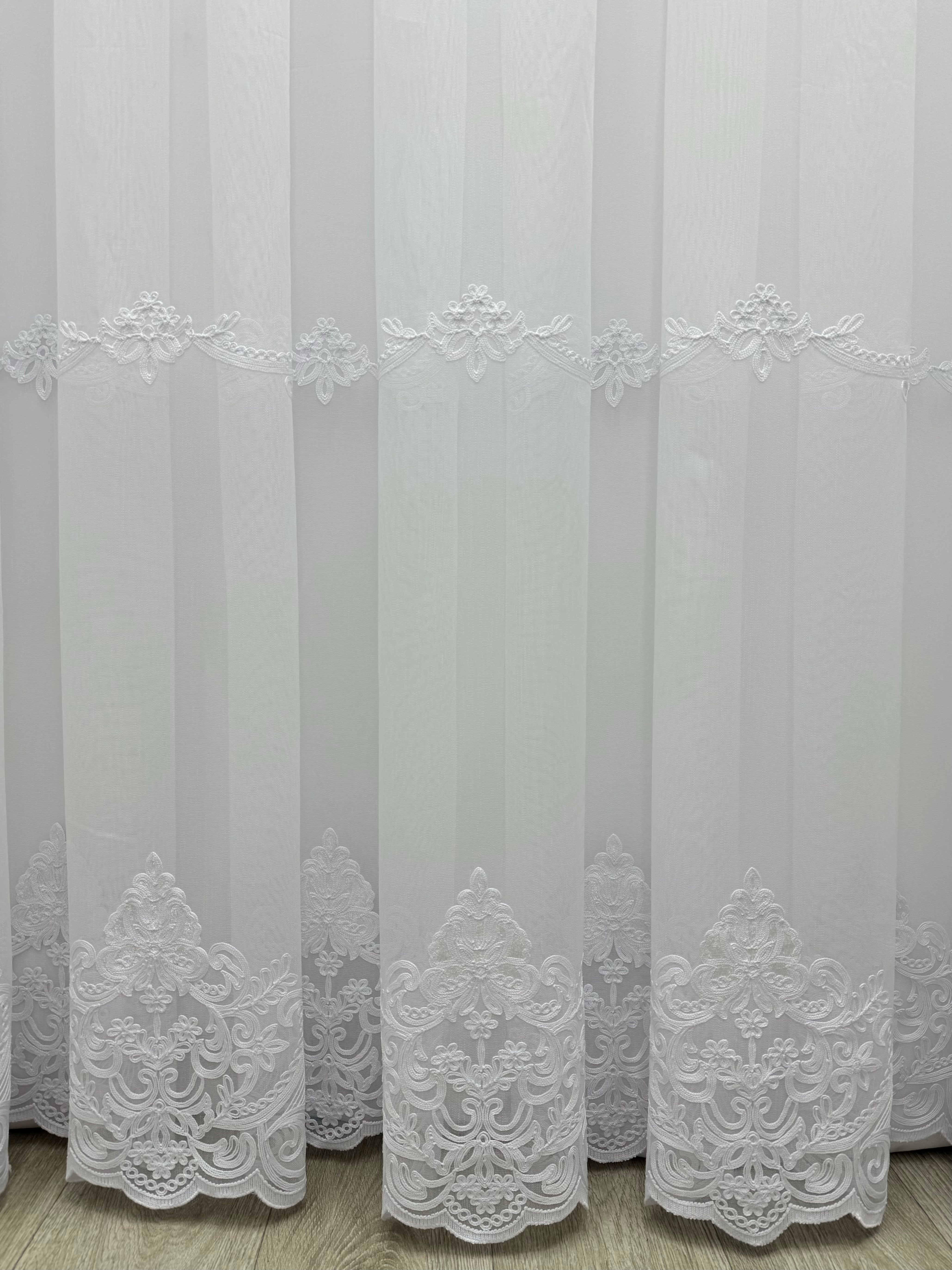 Bamboo-based sheer curtain with embroidery on the bottom, white color