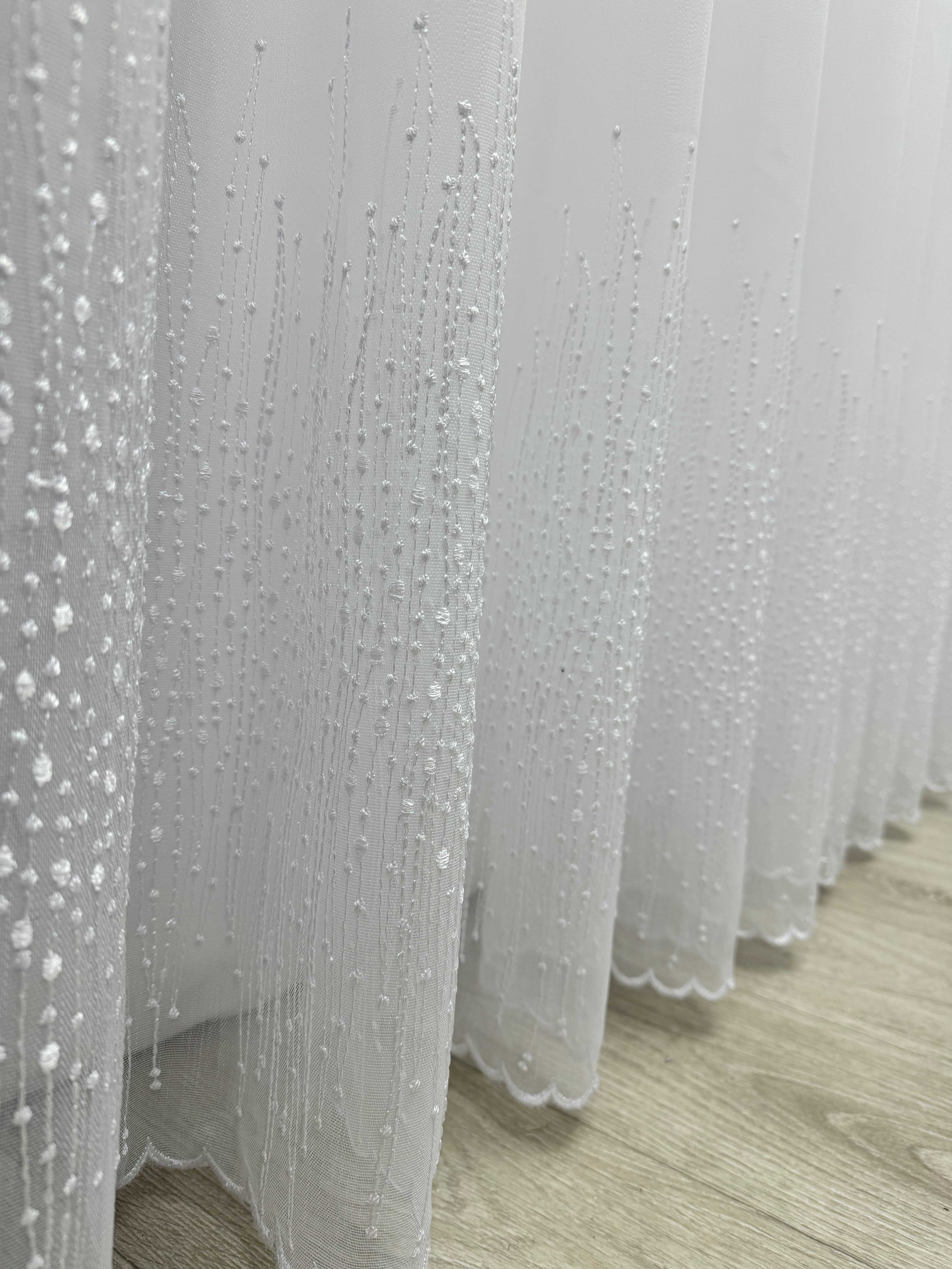 Bamboo-based sheer curtain with embroidery on the bottom, white color