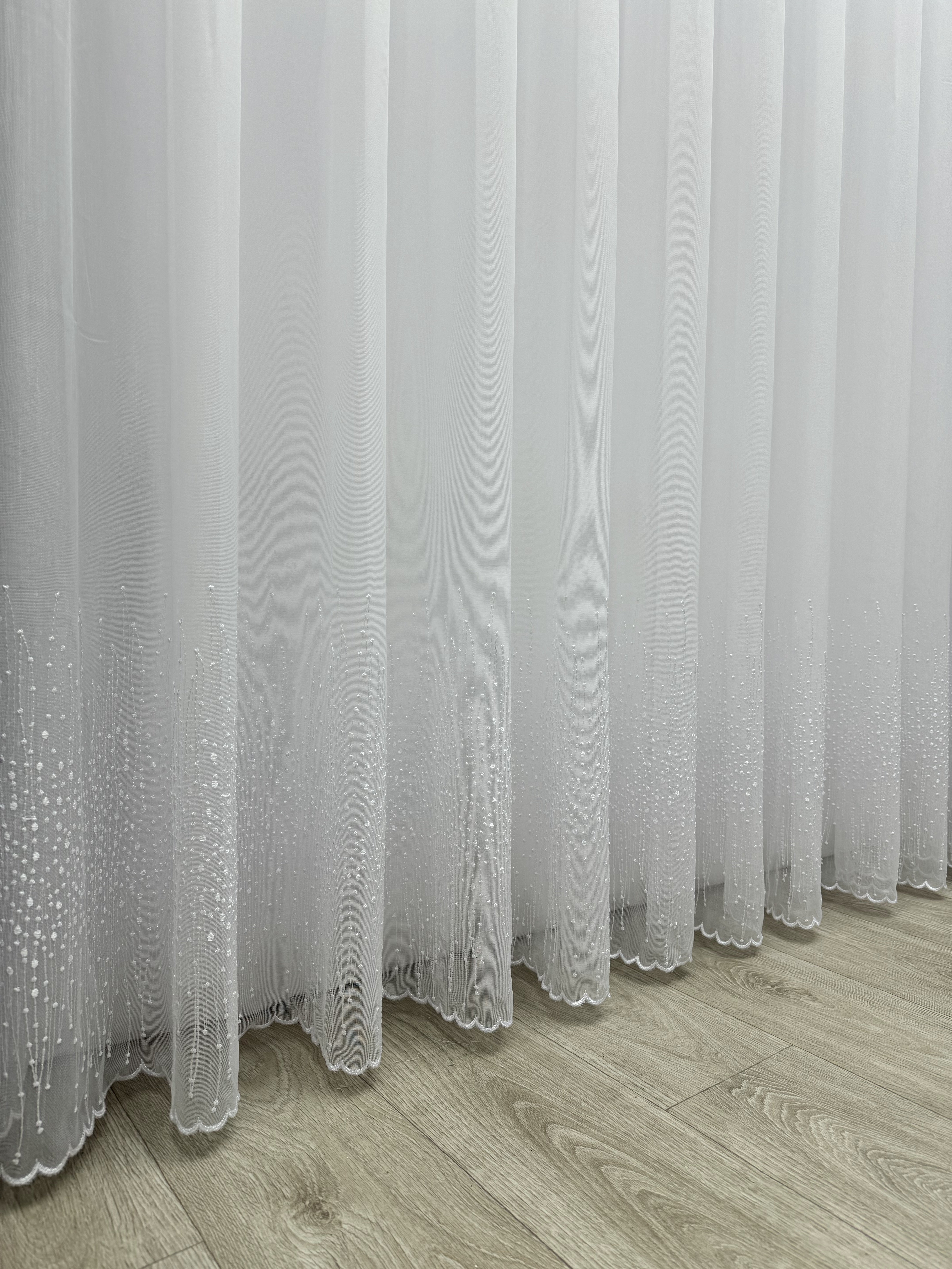 Bamboo-based sheer curtain with embroidery on the bottom, white color