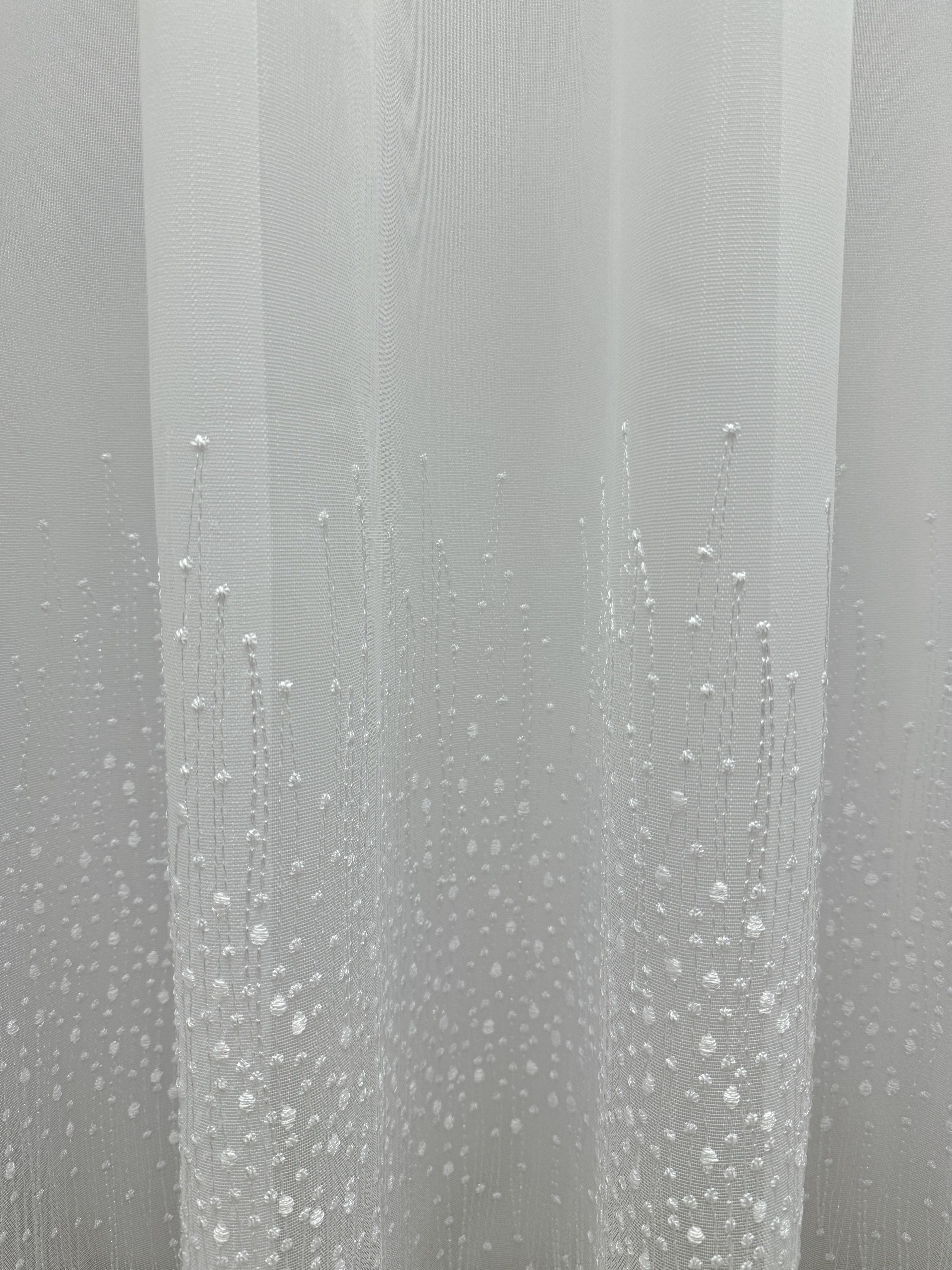 Bamboo-based sheer curtain with embroidery on the bottom, white color