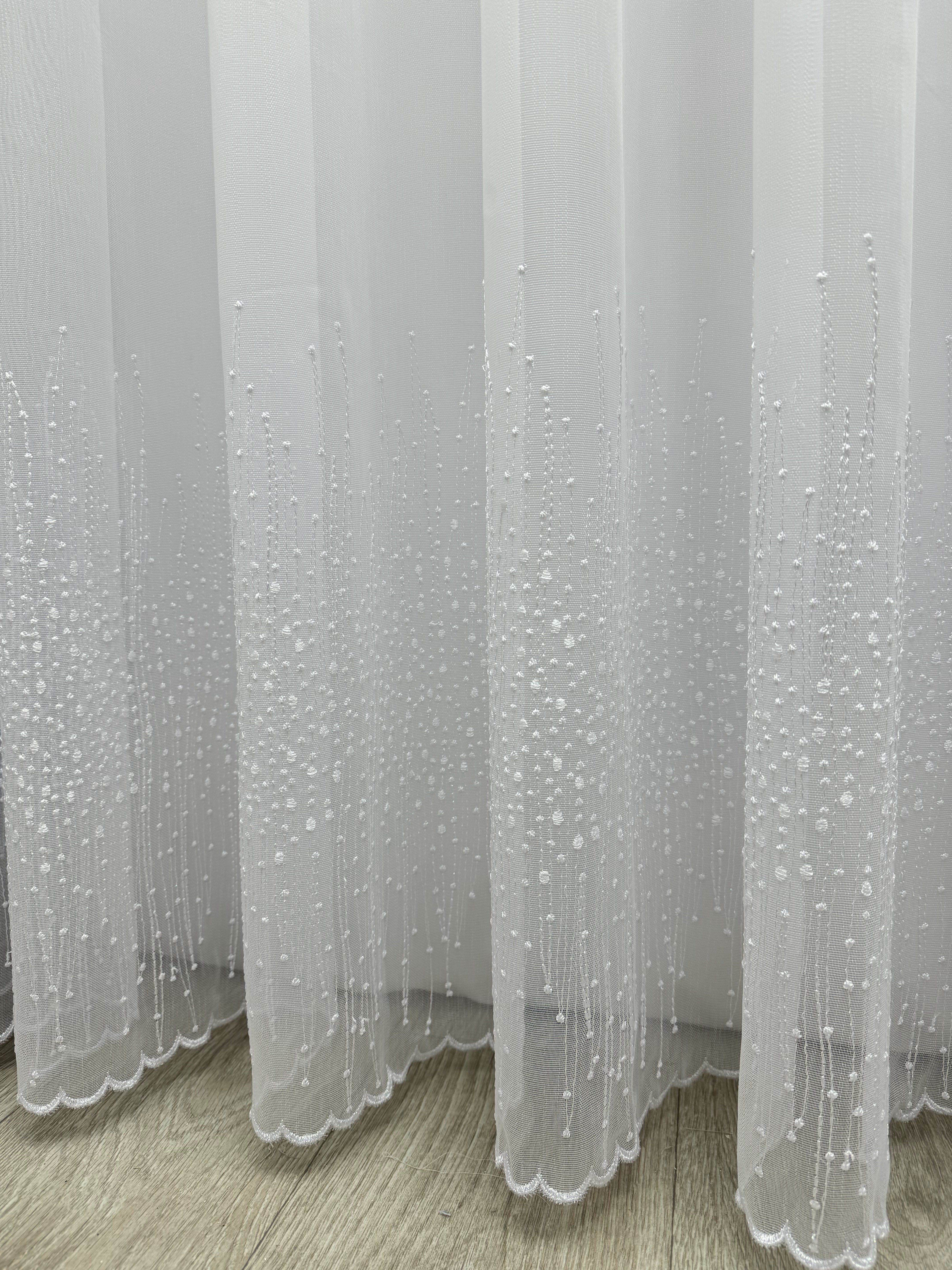Bamboo-based sheer curtain with embroidery on the bottom, white color