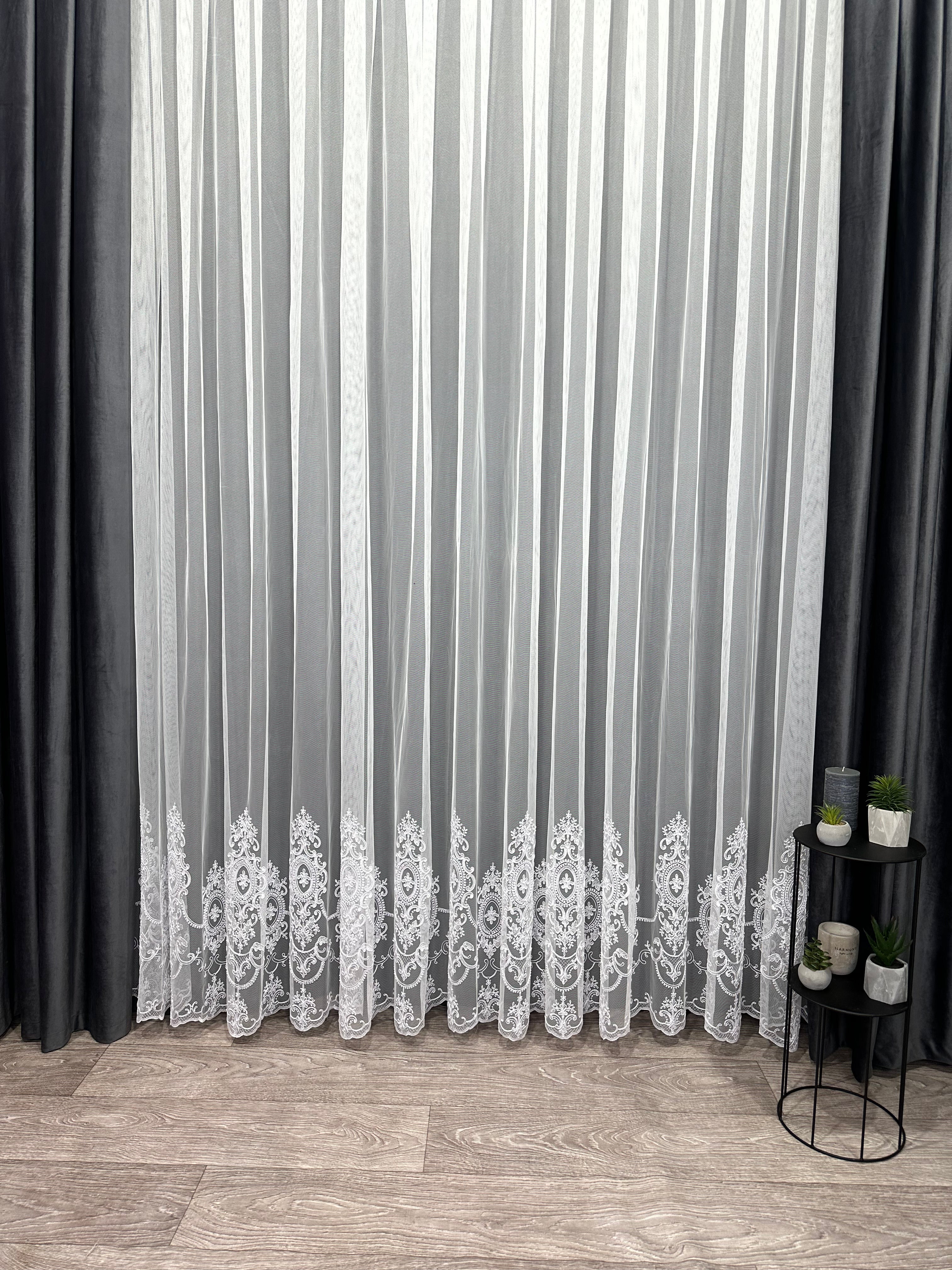 Sheer curtain based on tulle with embroidery on the bottom, white color