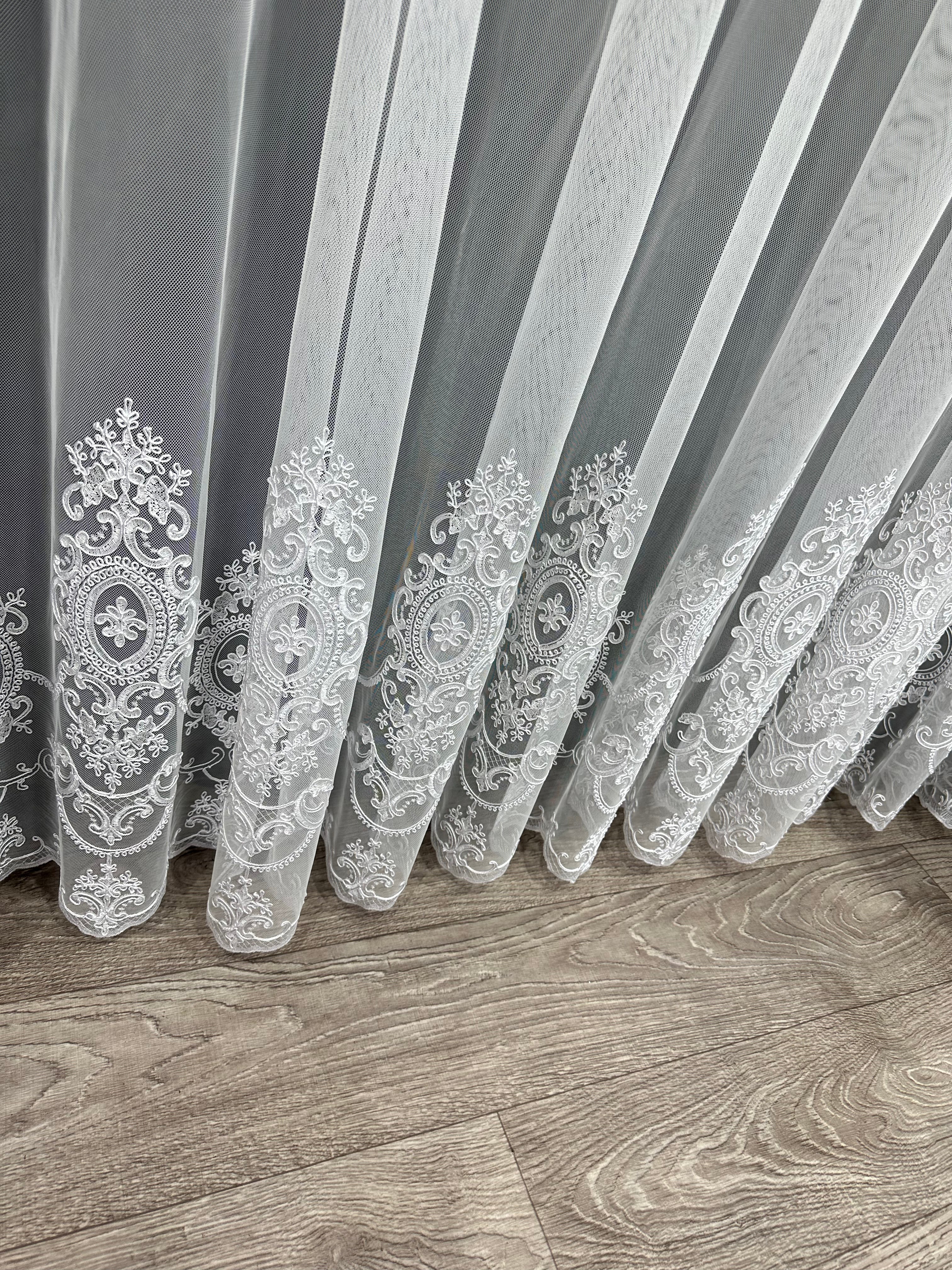 Sheer curtain based on tulle with embroidery on the bottom, white color