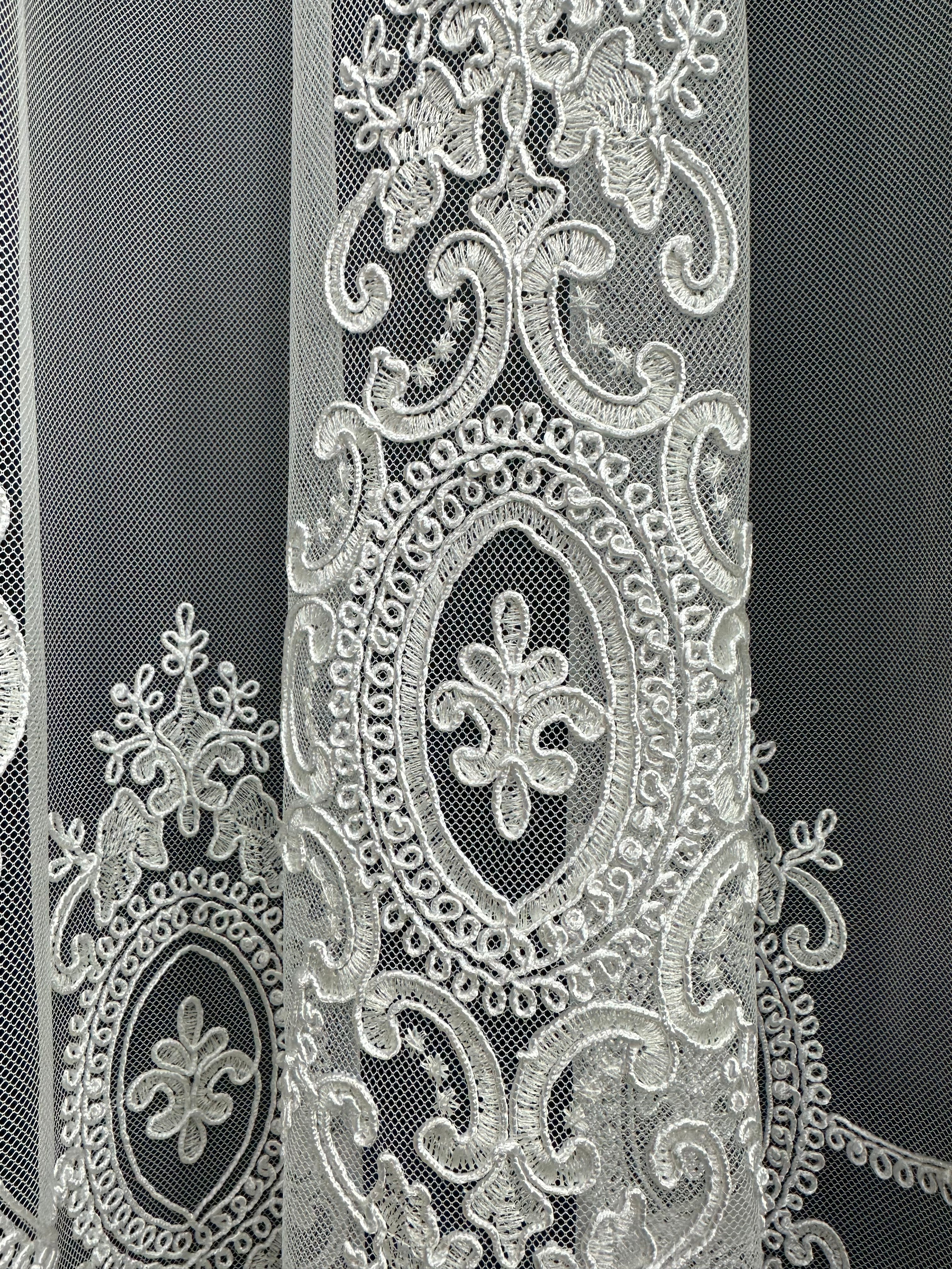 Sheer curtain based on tulle with embroidery on the bottom, milk color