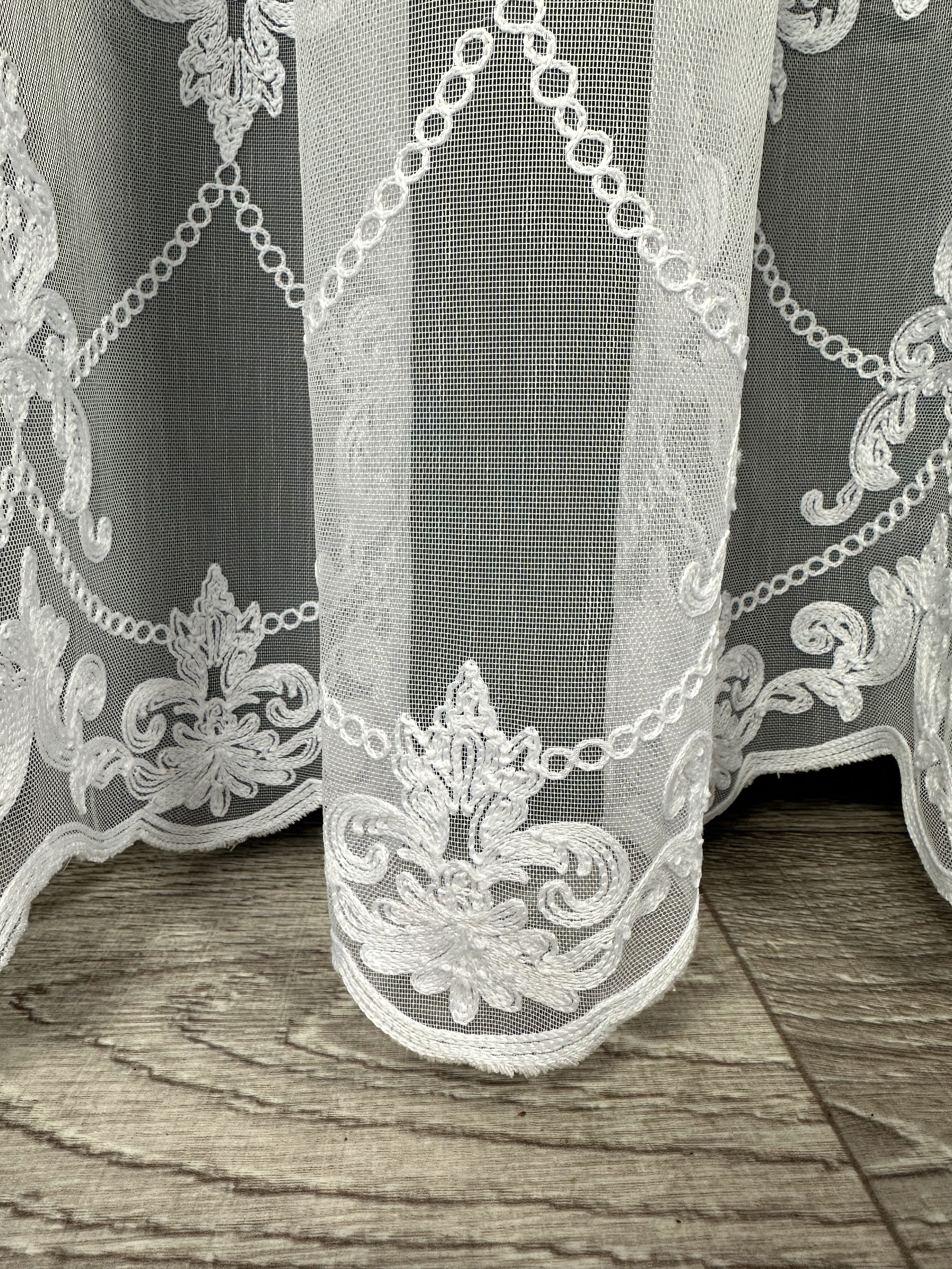 Sheer curtain with chenille embroidery on the bottom , white color