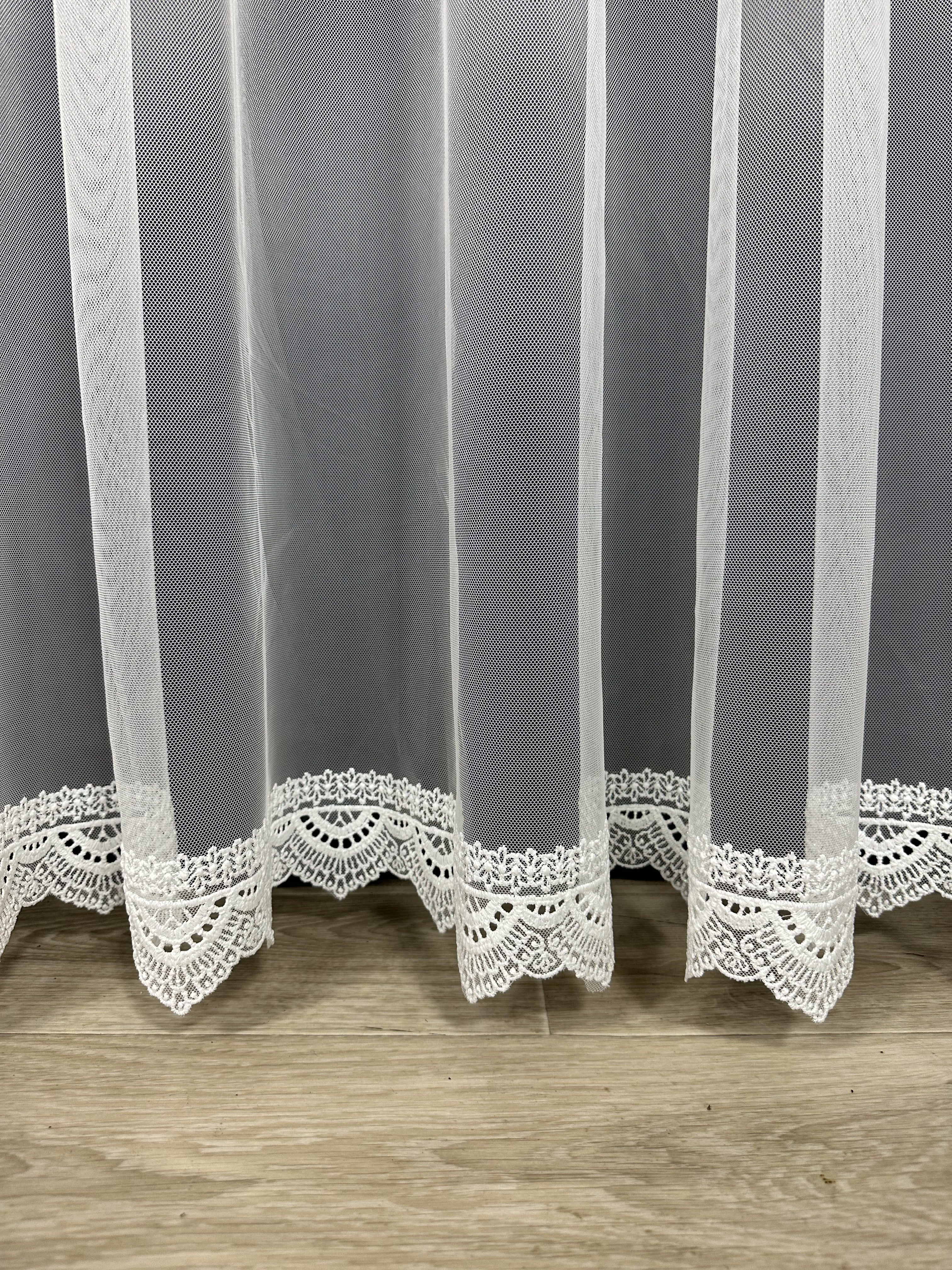 Sheer curtain with beautiful embroidery at the bottom, milk color