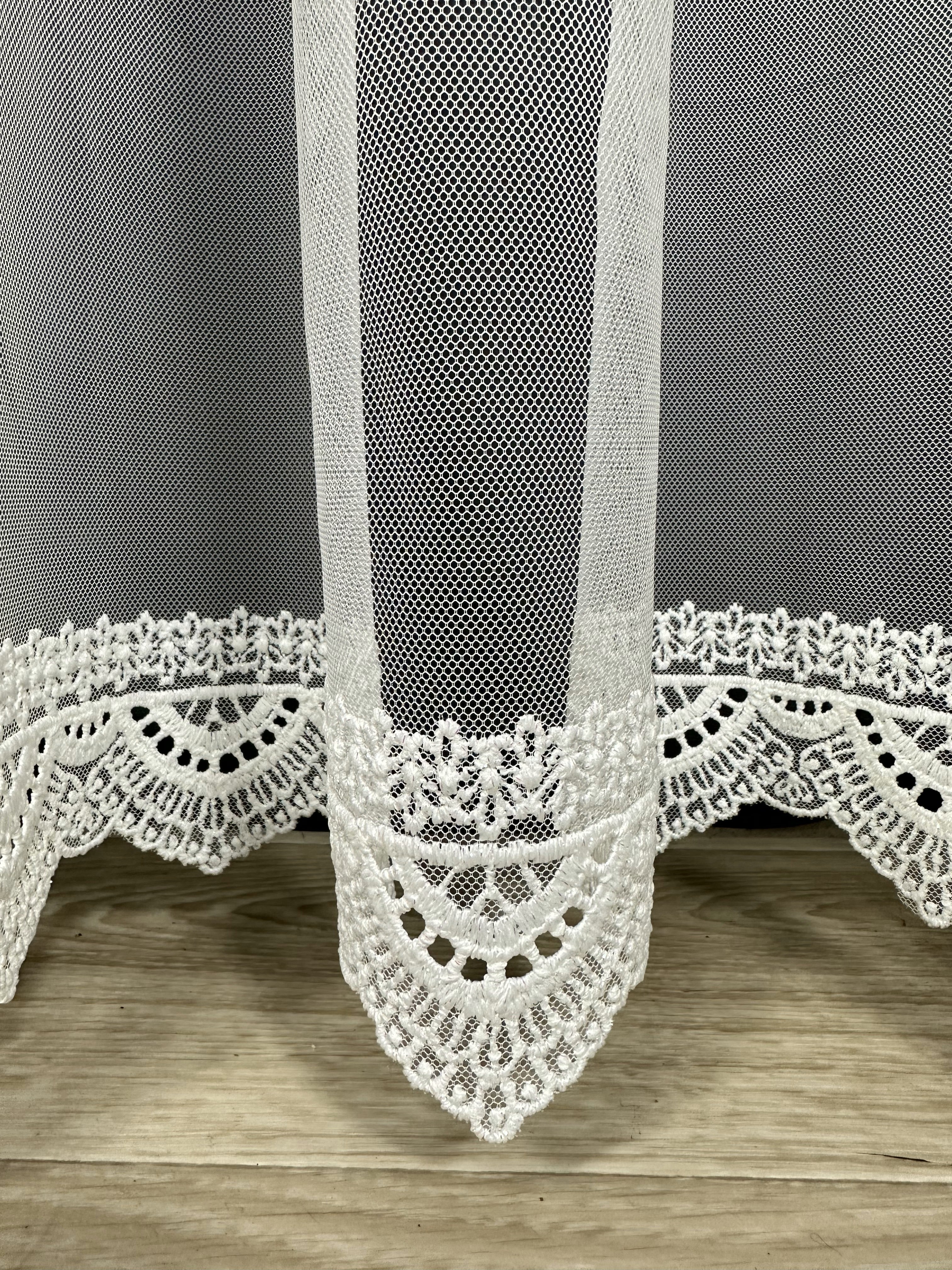 Sheer curtain with beautiful embroidery at the bottom, milk color