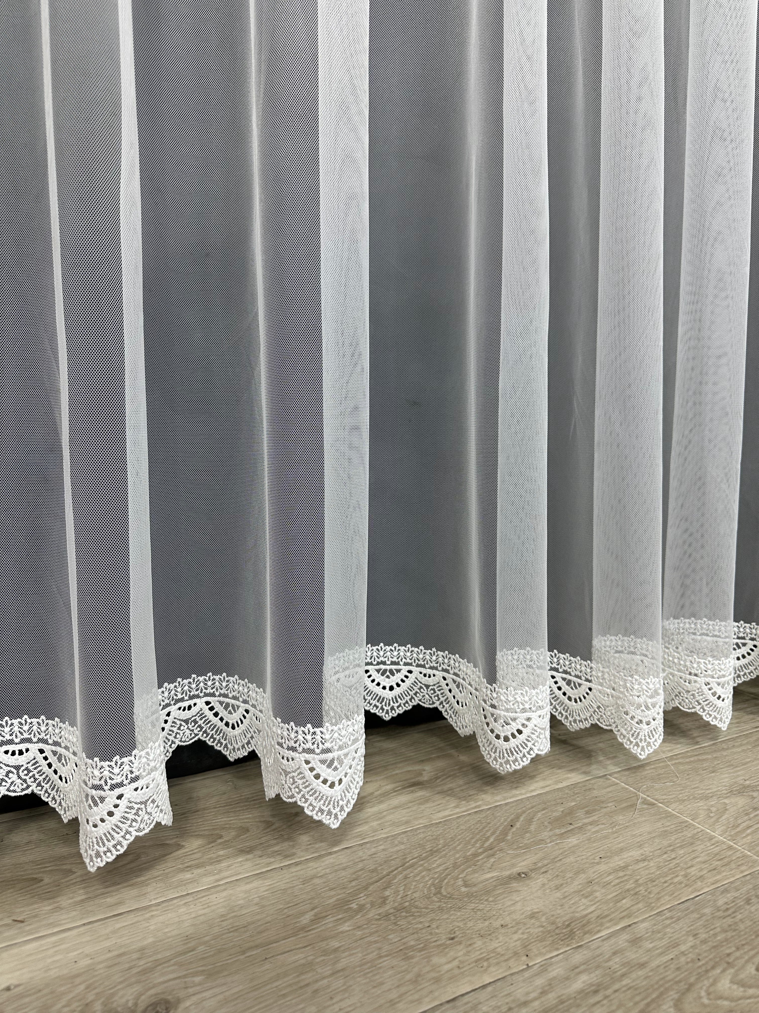 Sheer curtain with beautiful embroidery at the bottom, milk color