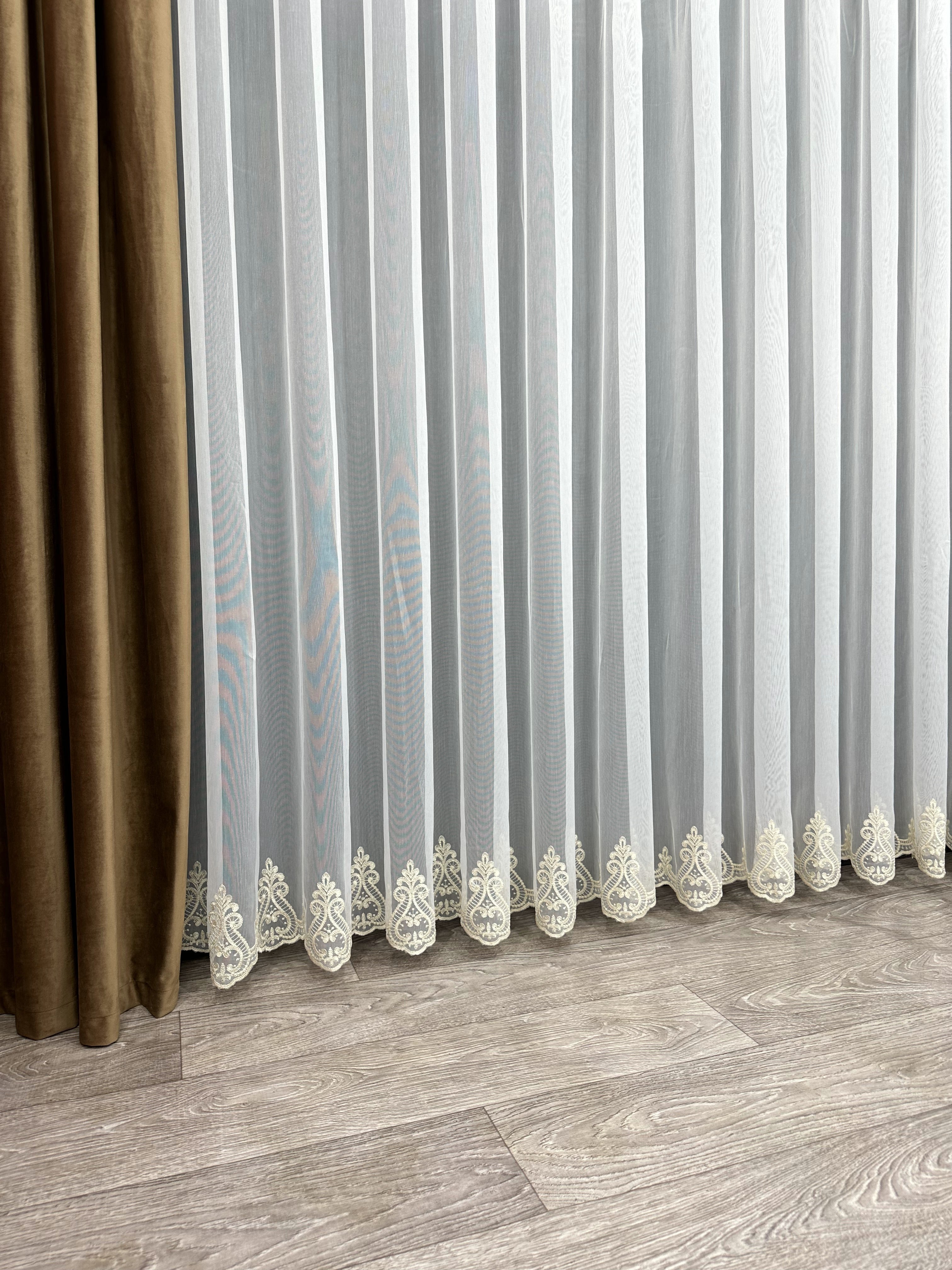 Bamboo-based sheer curtain with embroidery on the bottom, gold color