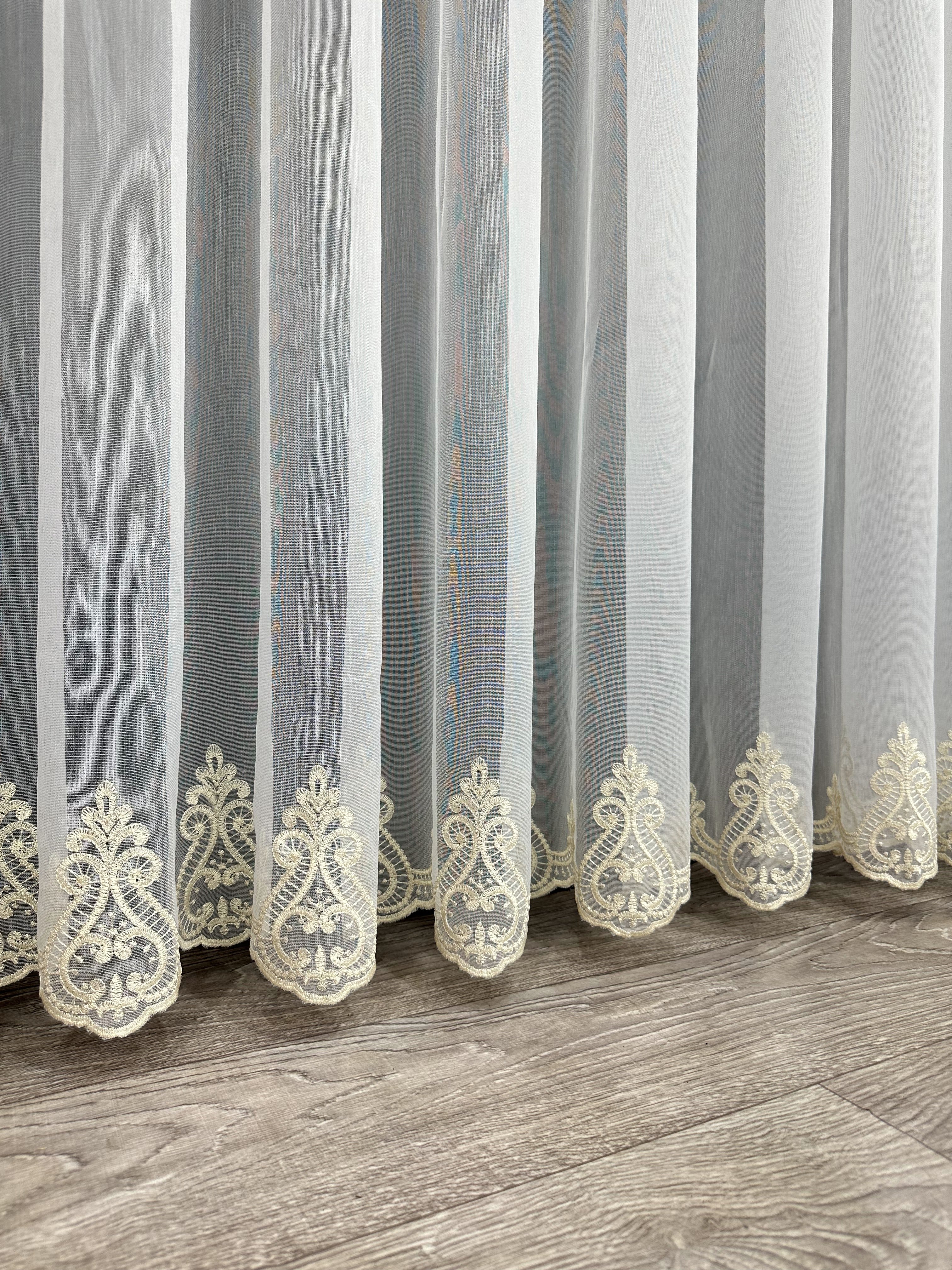Bamboo-based sheer curtain with embroidery on the bottom, gold color