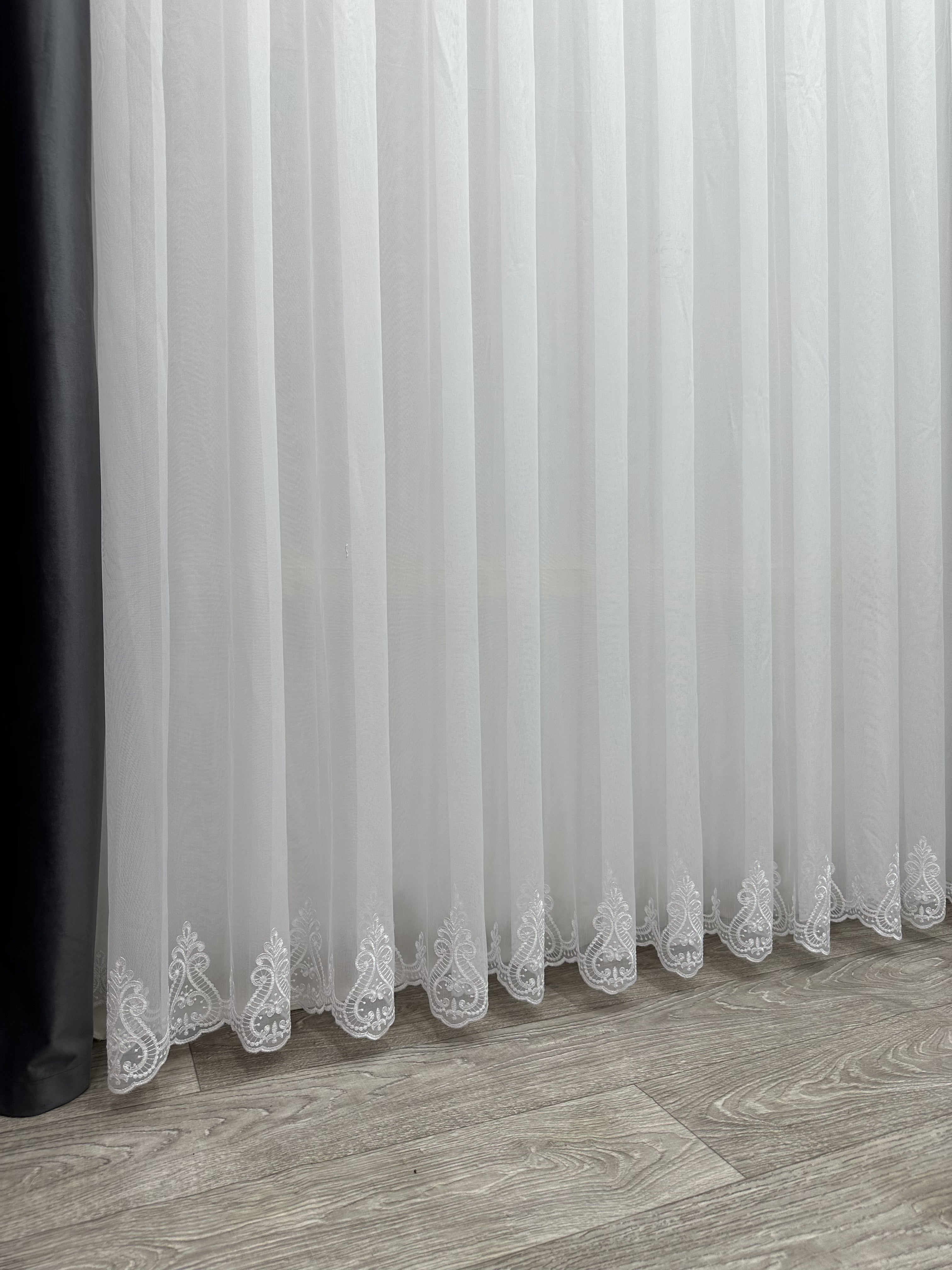 Bamboo-based sheer curtain with embroidery on the bottom, white color