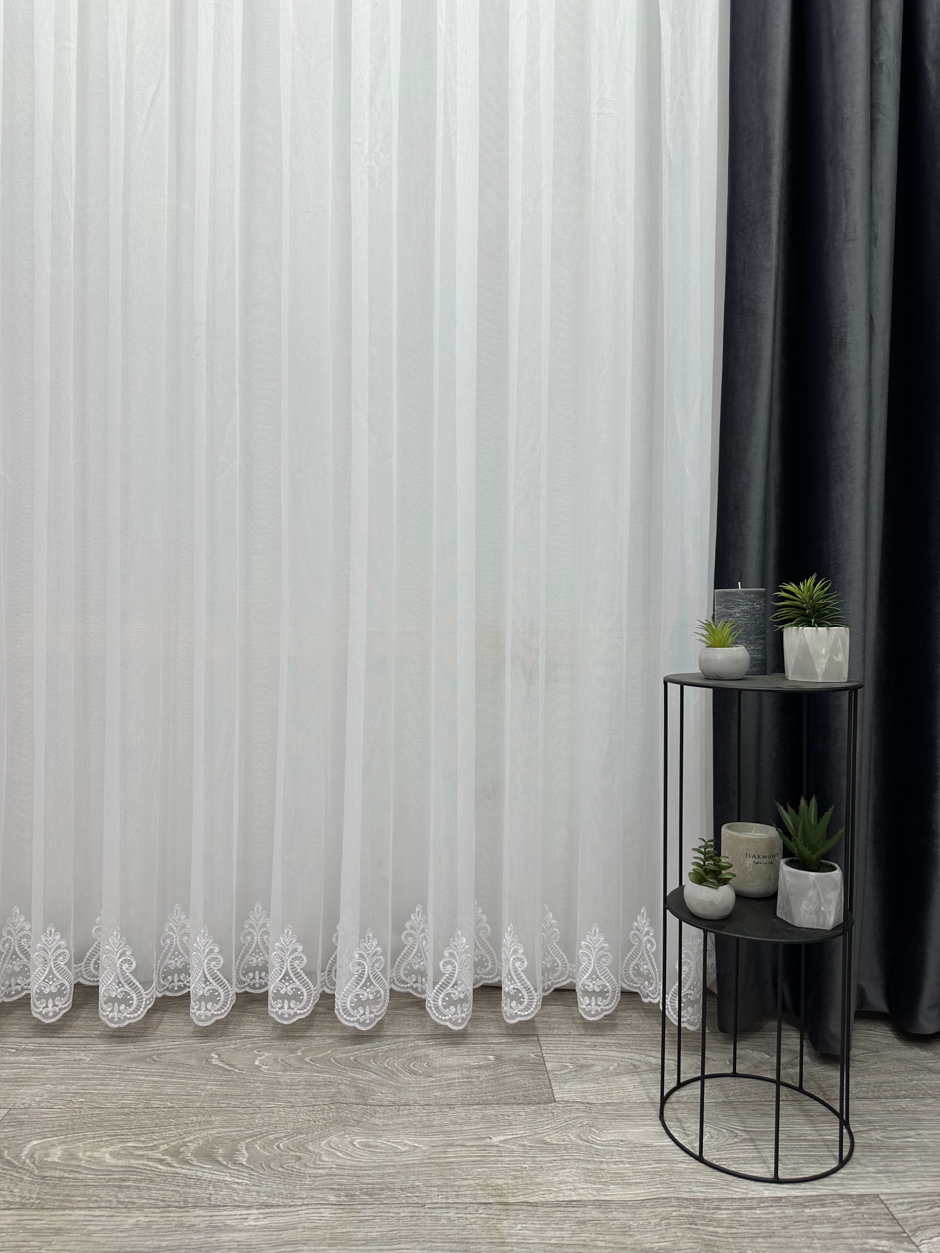 Bamboo-based sheer curtain with embroidery on the bottom, white color