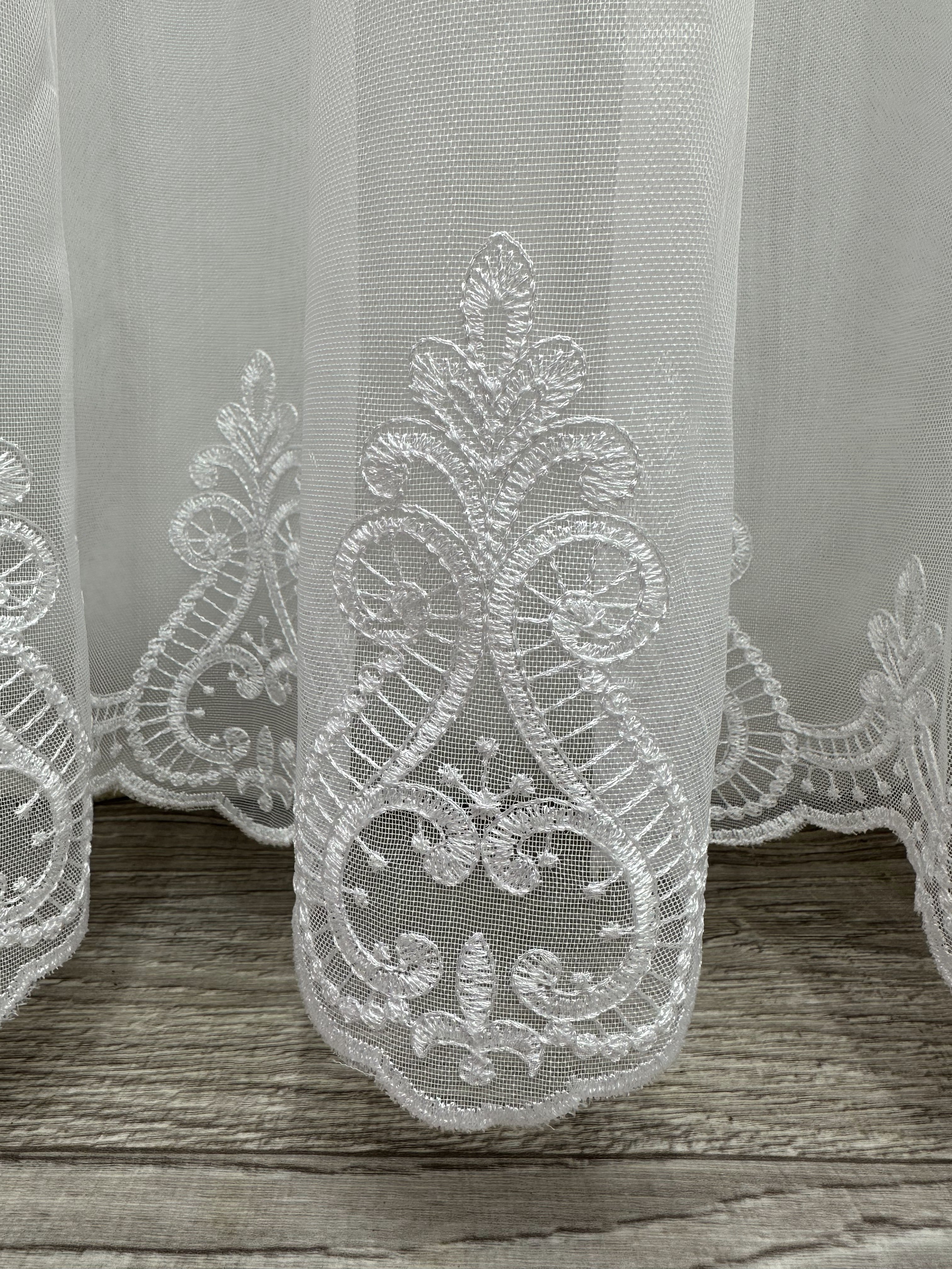 Bamboo-based sheer curtain with embroidery on the bottom, white color