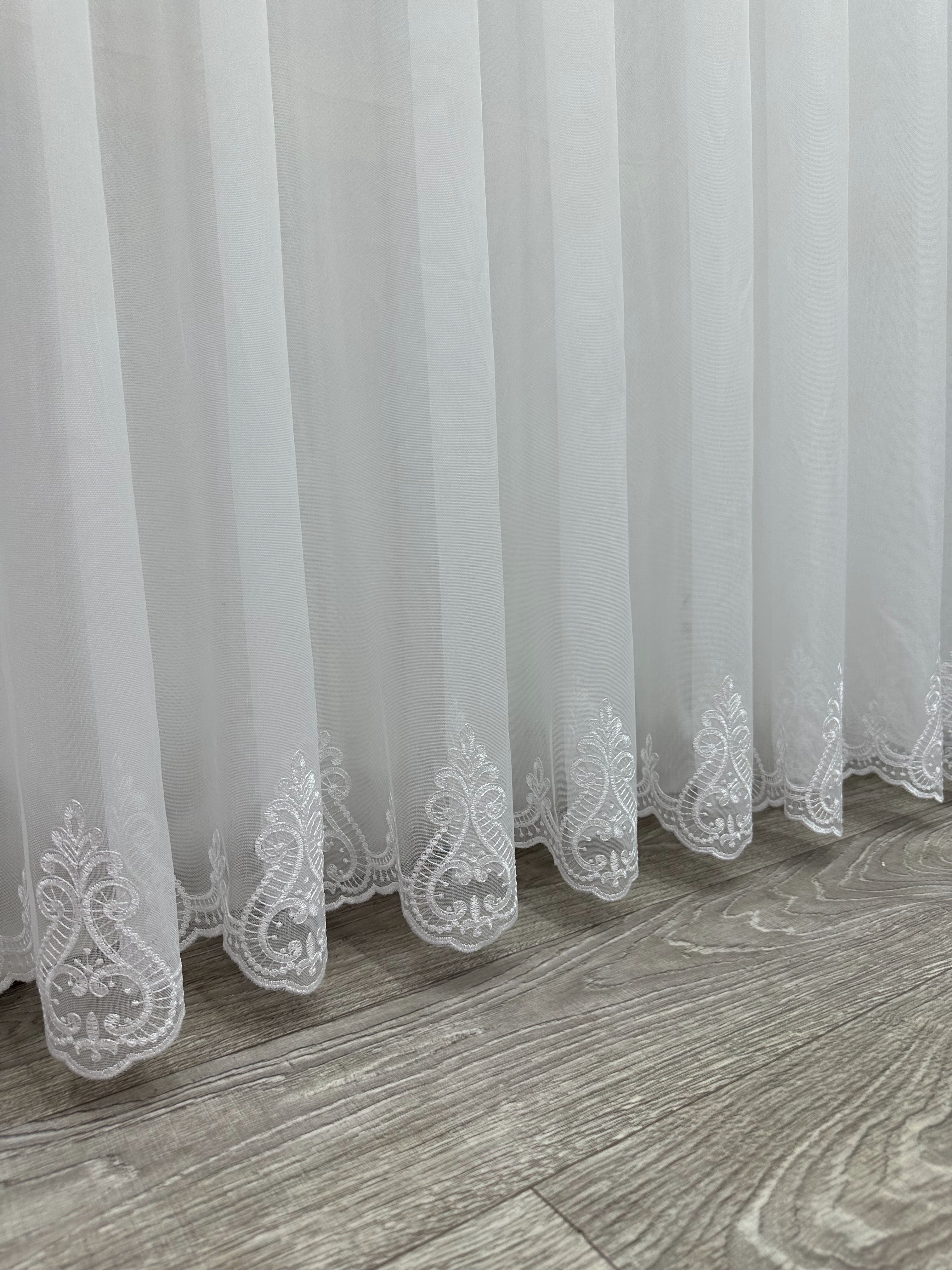 Bamboo-based sheer curtain with embroidery on the bottom, white color