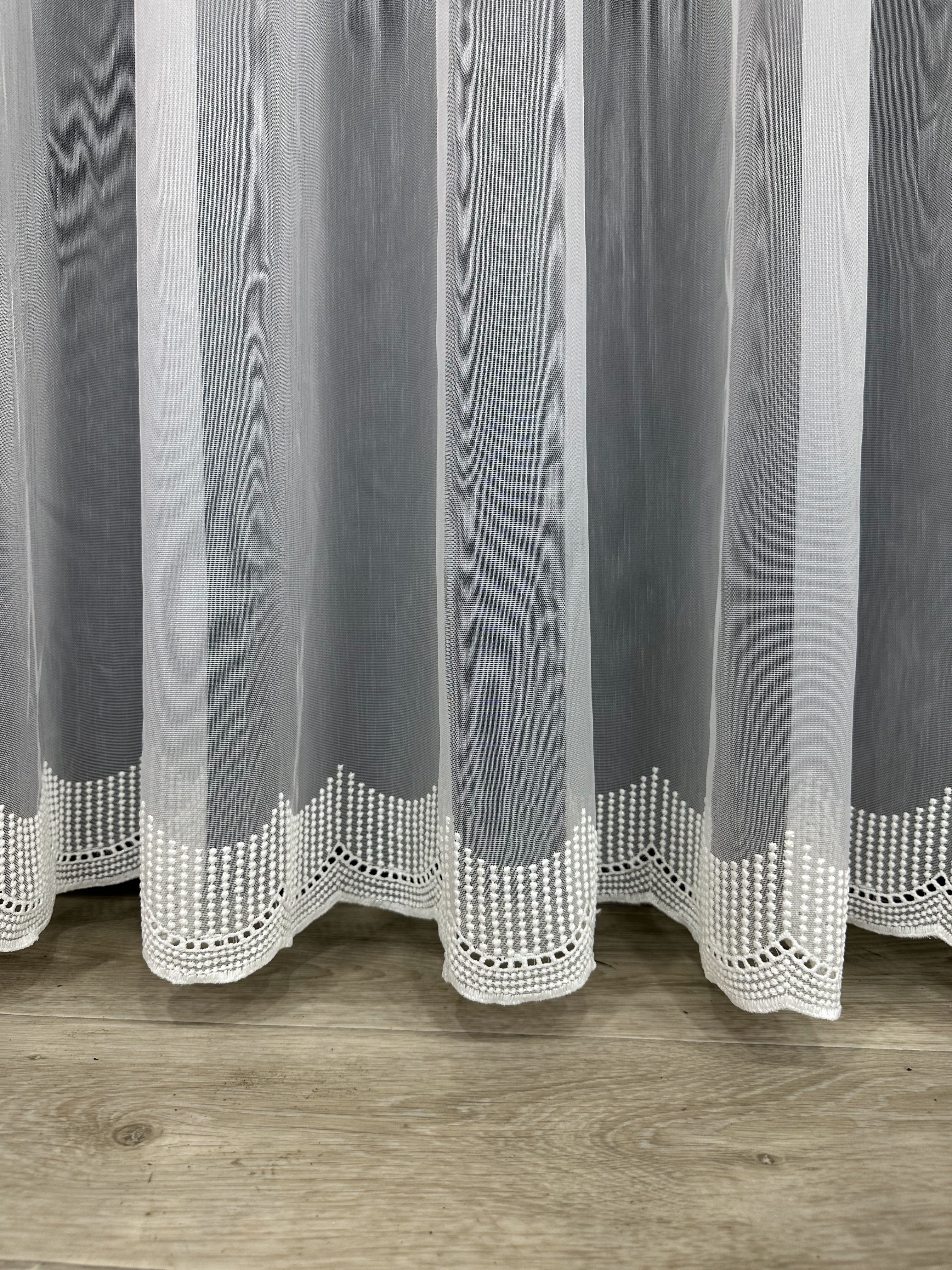Sheer curtain with chenille embroidery on the bottom , milk color