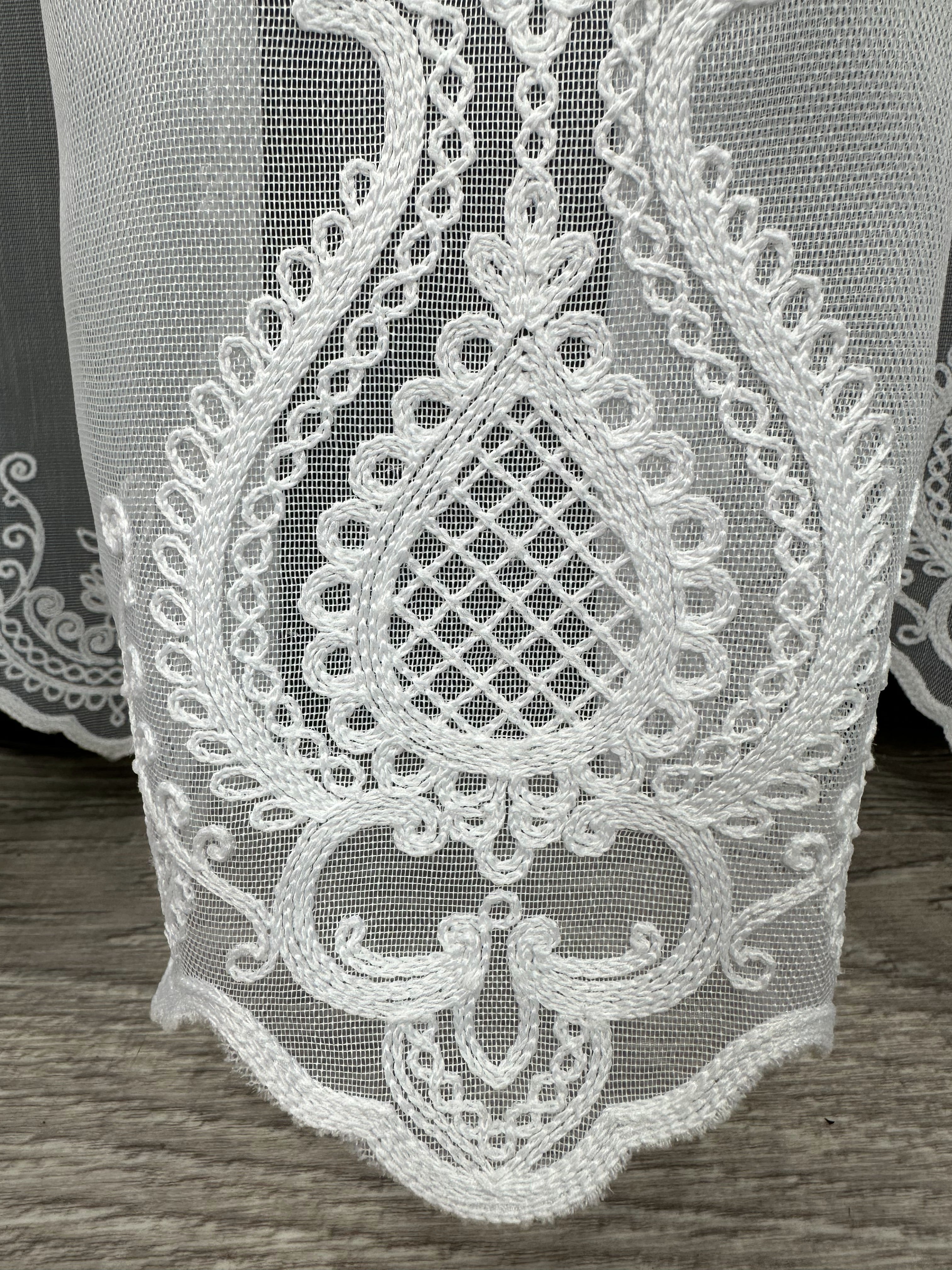 Sheer curtain with chenille embroidery on the bottom , white color