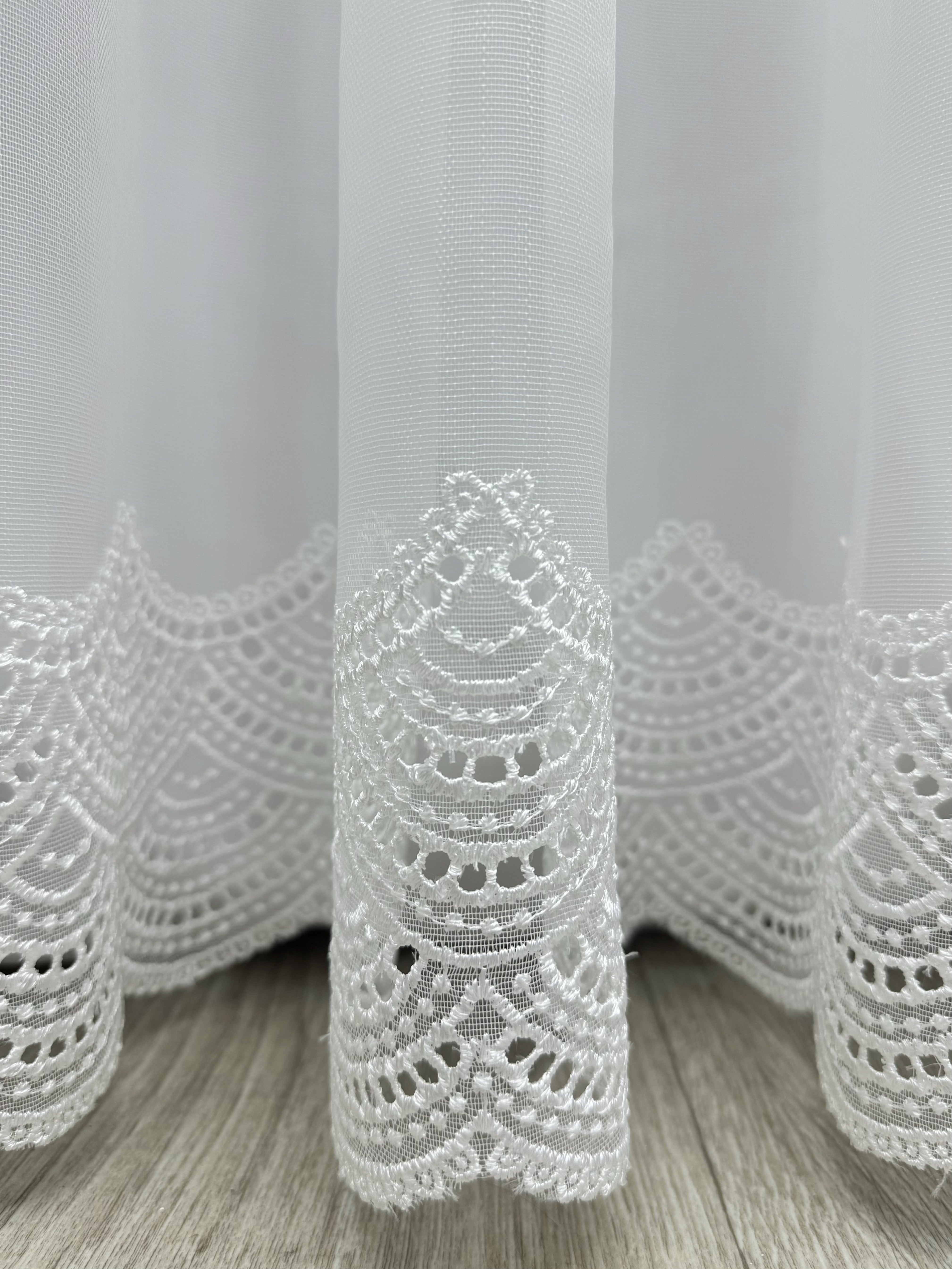 Sheer curtain with chenille embroidery on the bottom , milk color