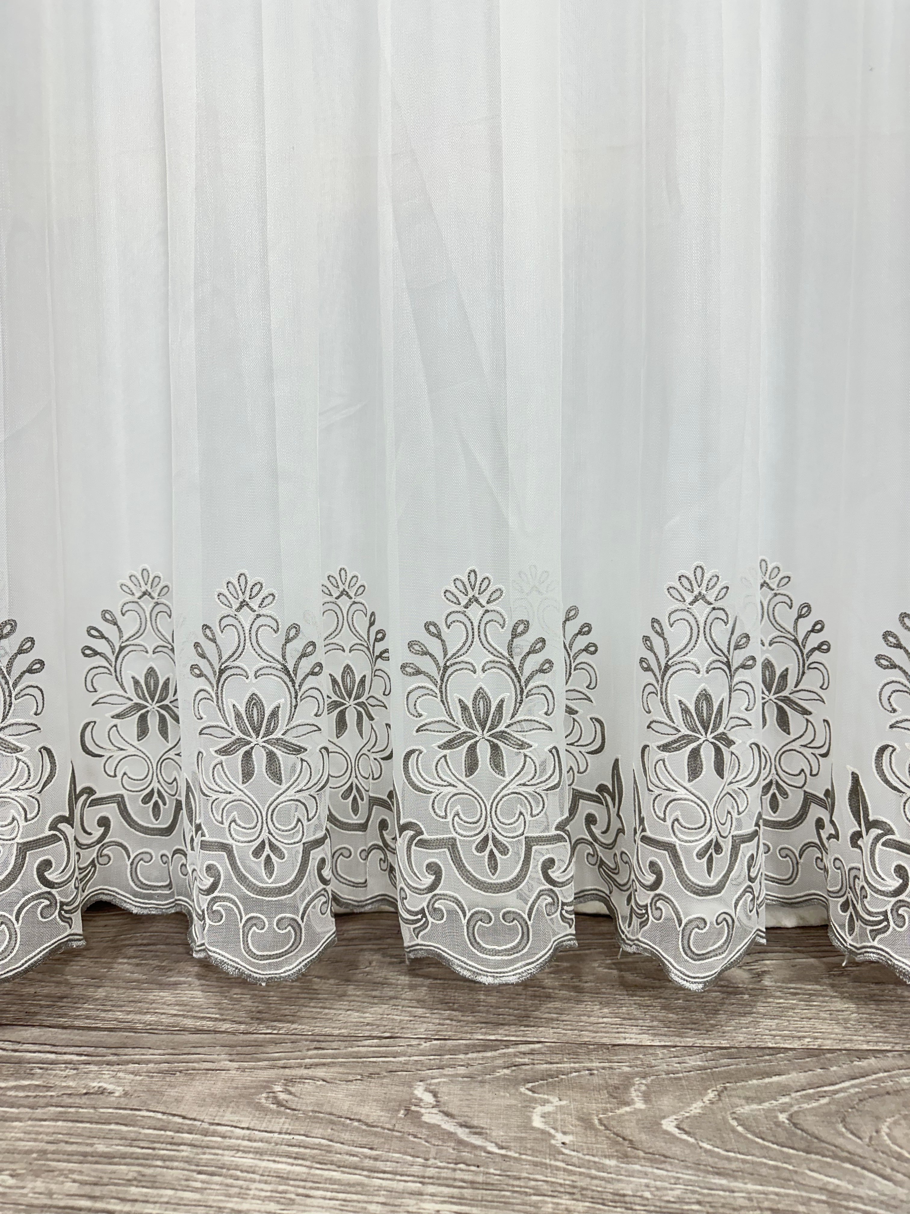 Sheer curtain with chenille embroidery on the bottom , gray color