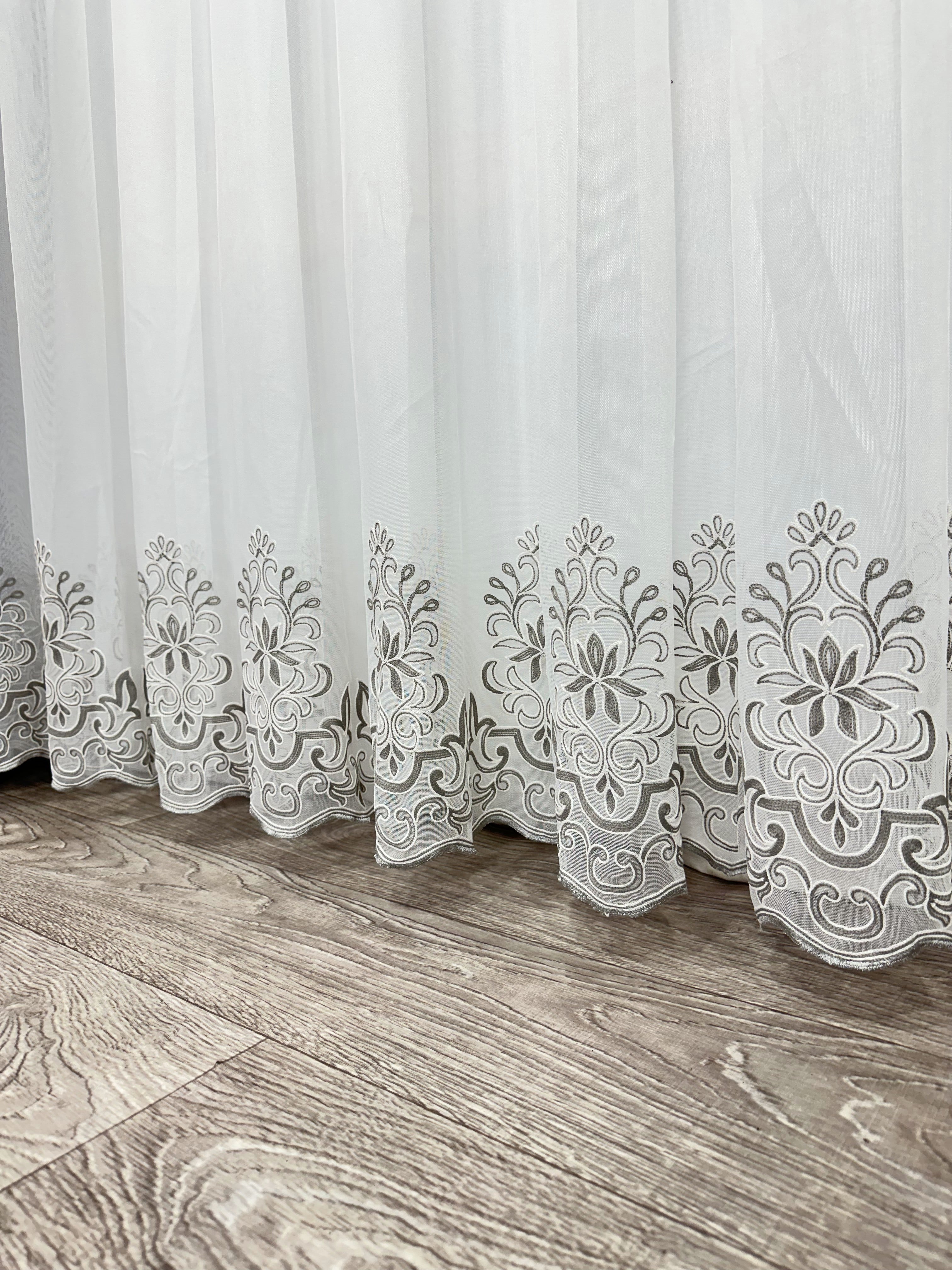 Sheer curtain with chenille embroidery on the bottom , gray color