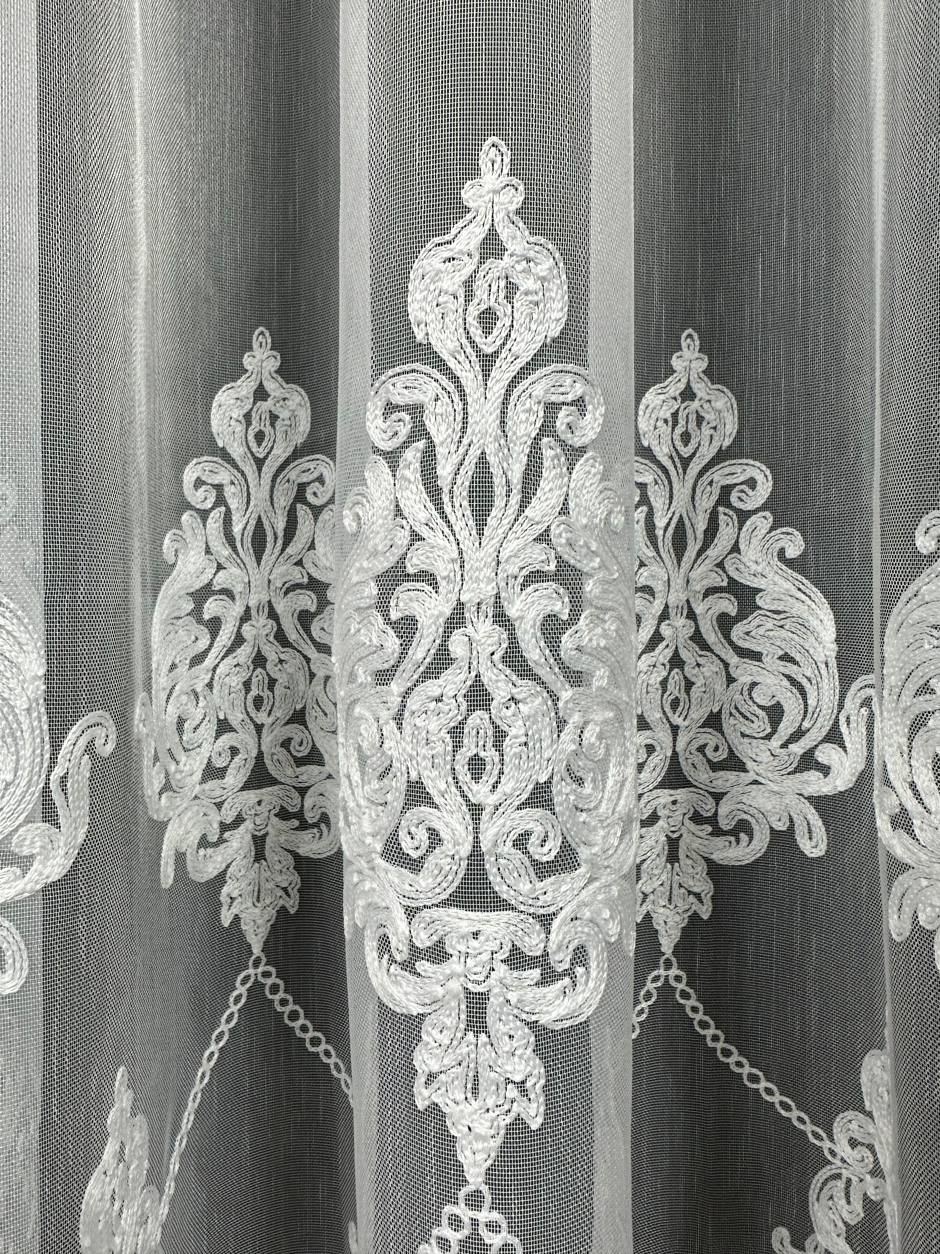 Sheer curtain with chenille embroidery on the bottom , milk color