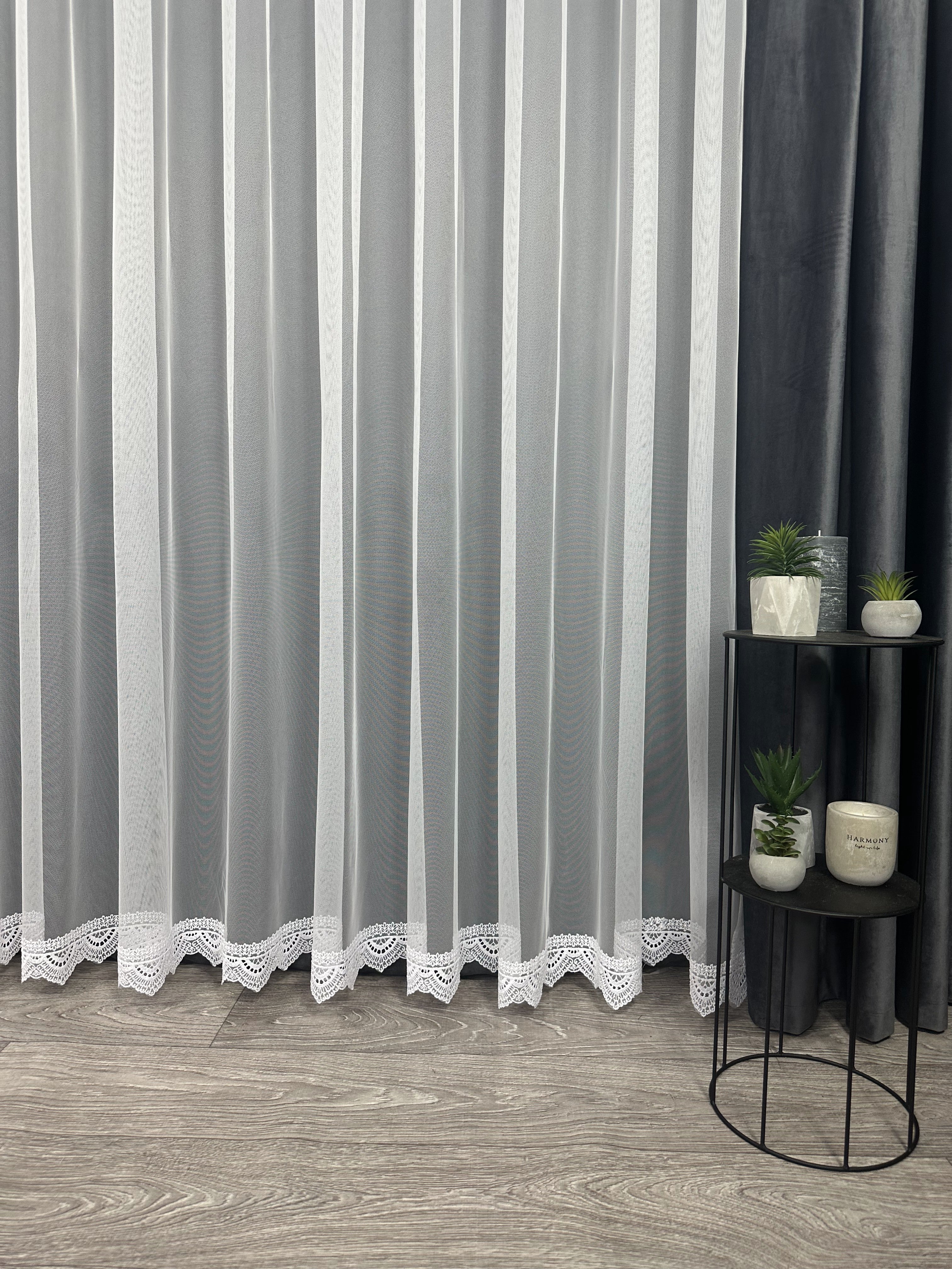 Sheer curtain with beautiful embroidery at the bottom, white color