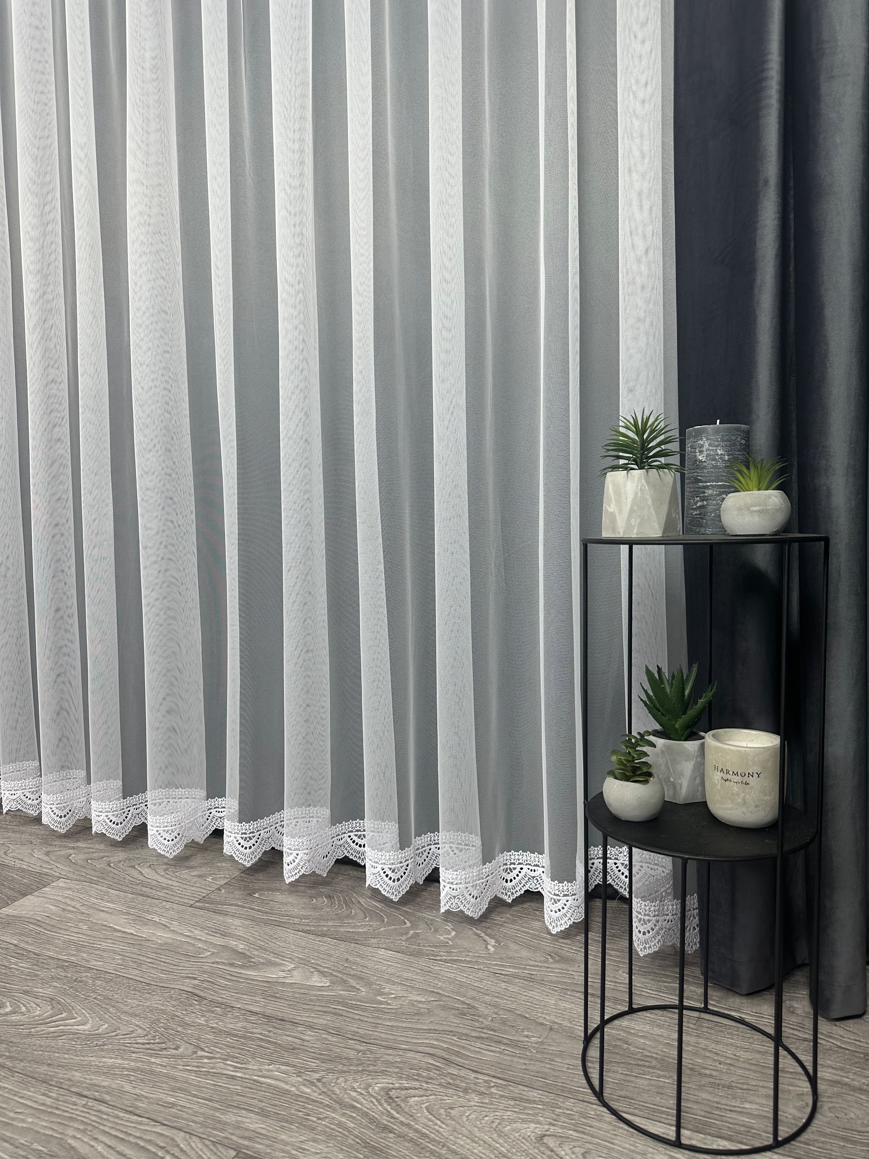 Sheer curtain with beautiful embroidery at the bottom, white color