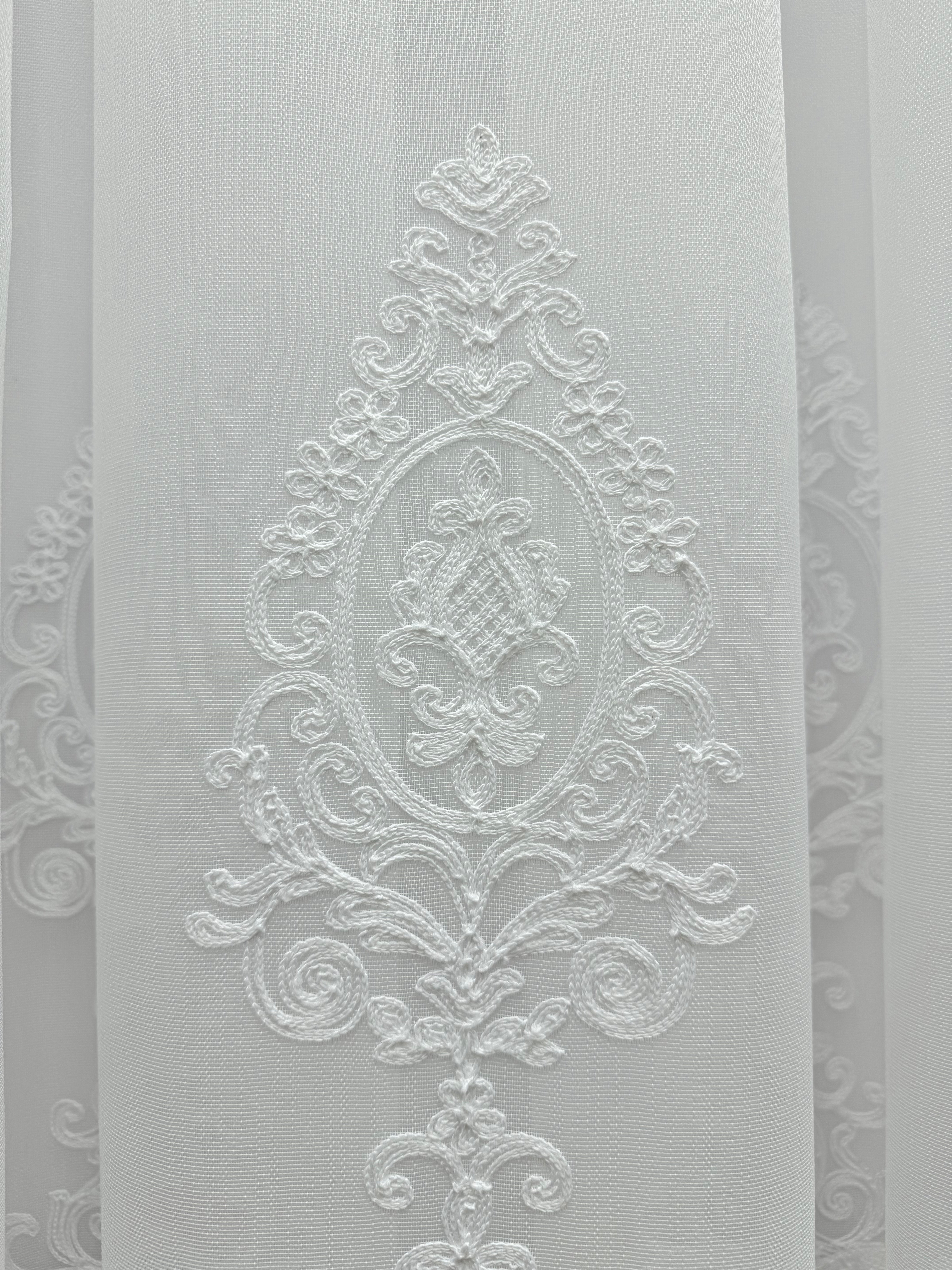 Sheer curtain with beautiful embroidery and velvet inserts, white color