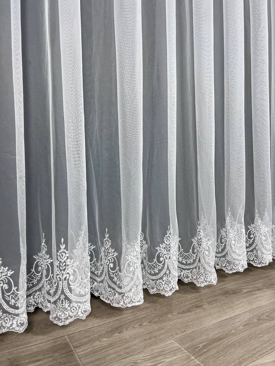 Sheer curtain with beautiful embroidery at the bottom, white color