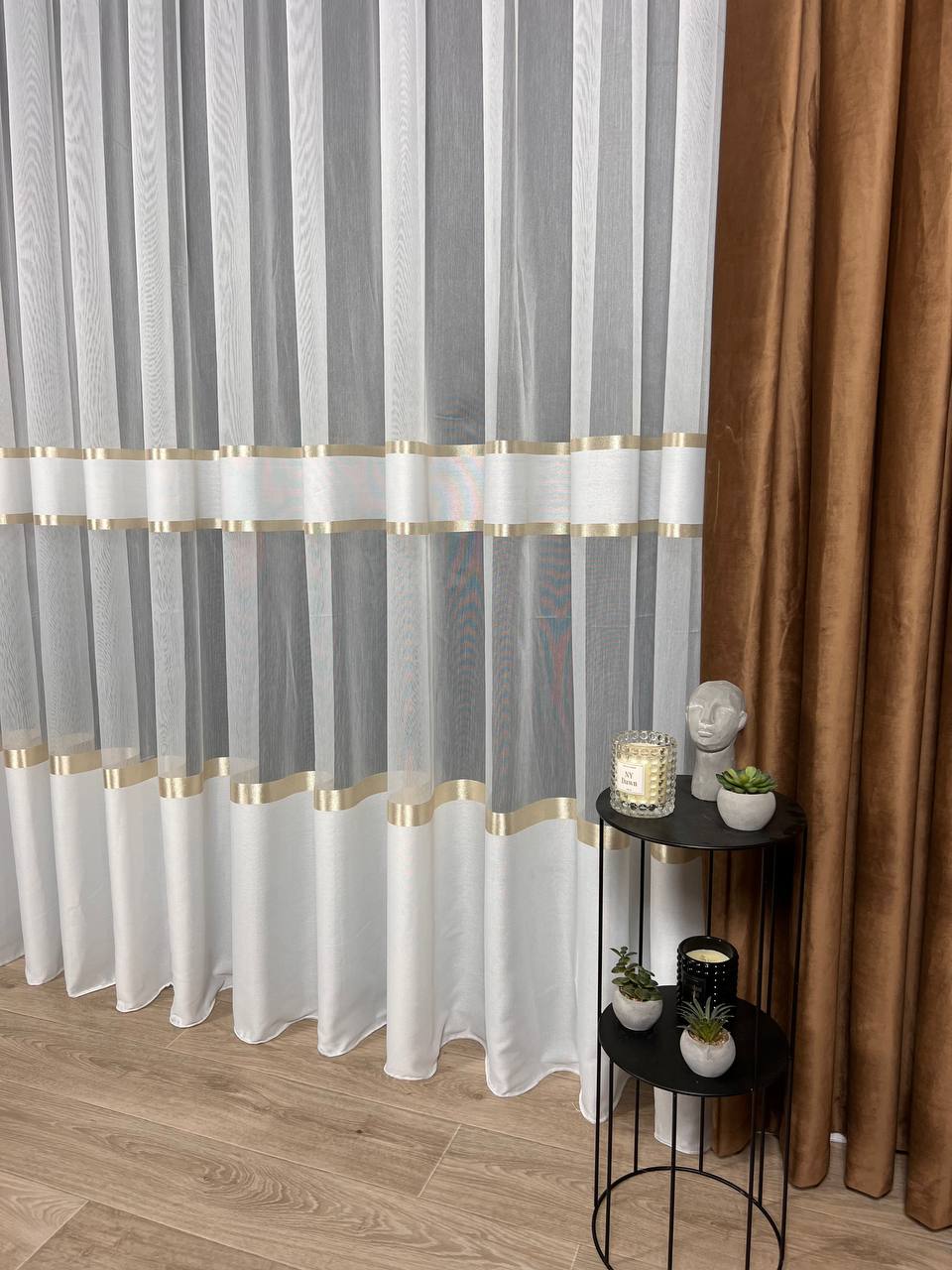 Sheer curtain with stripes and satin inserts, golden color