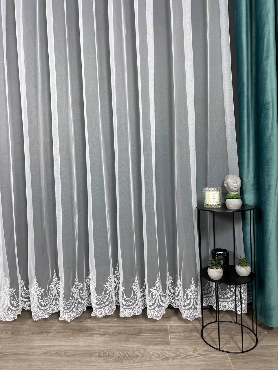 Sheer curtain with beautiful embroidery at the bottom, white color