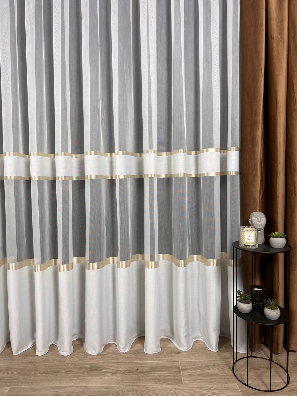 Sheer curtain with stripes and satin inserts, golden color