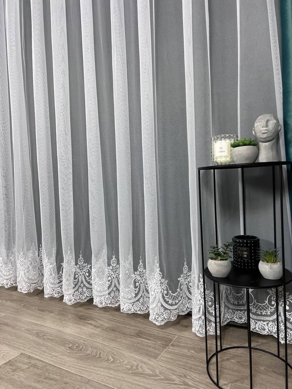 Sheer curtain with beautiful embroidery at the bottom, white color