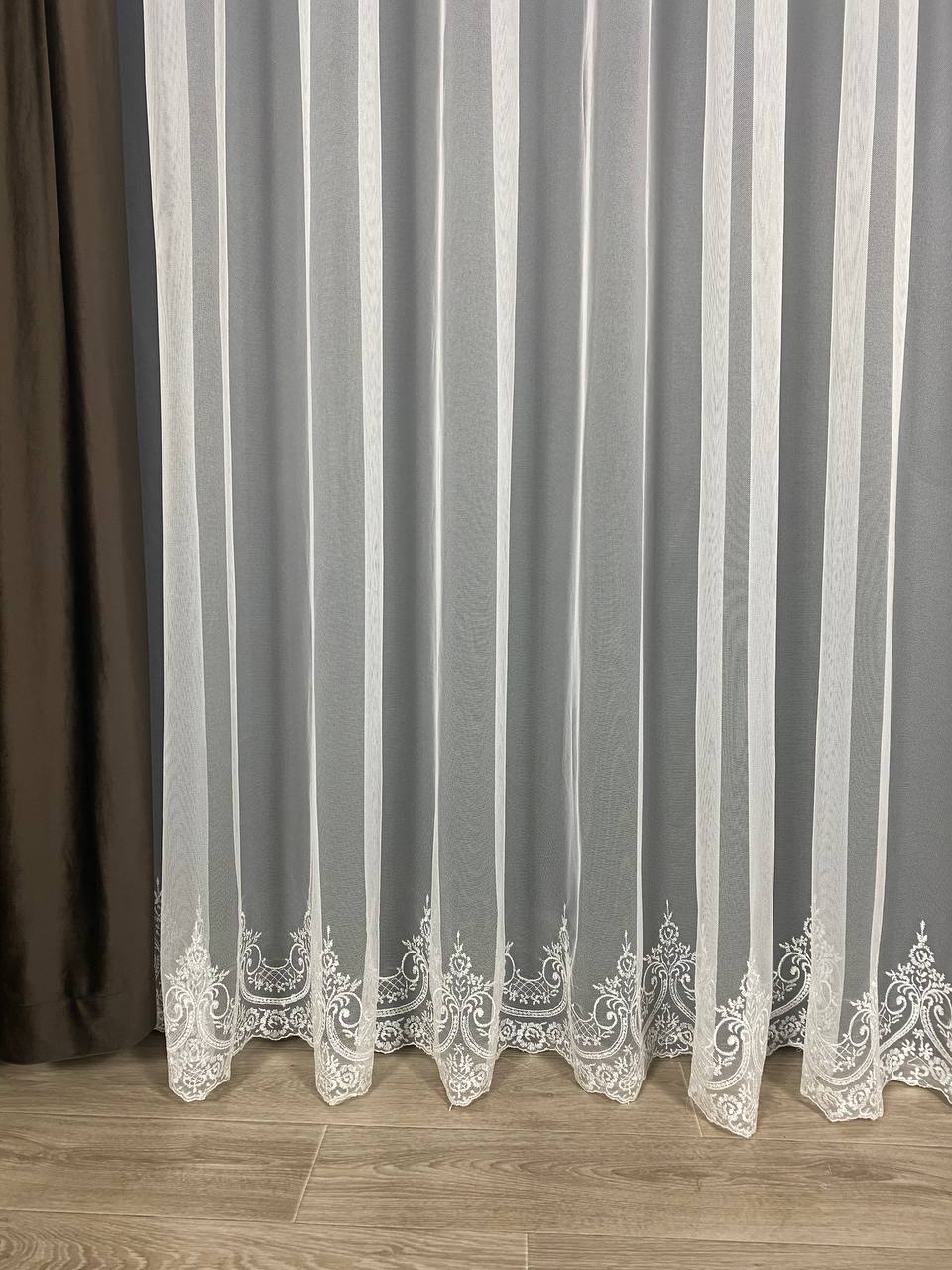 Sheer curtain with beautiful embroidery at the bottom, milk color