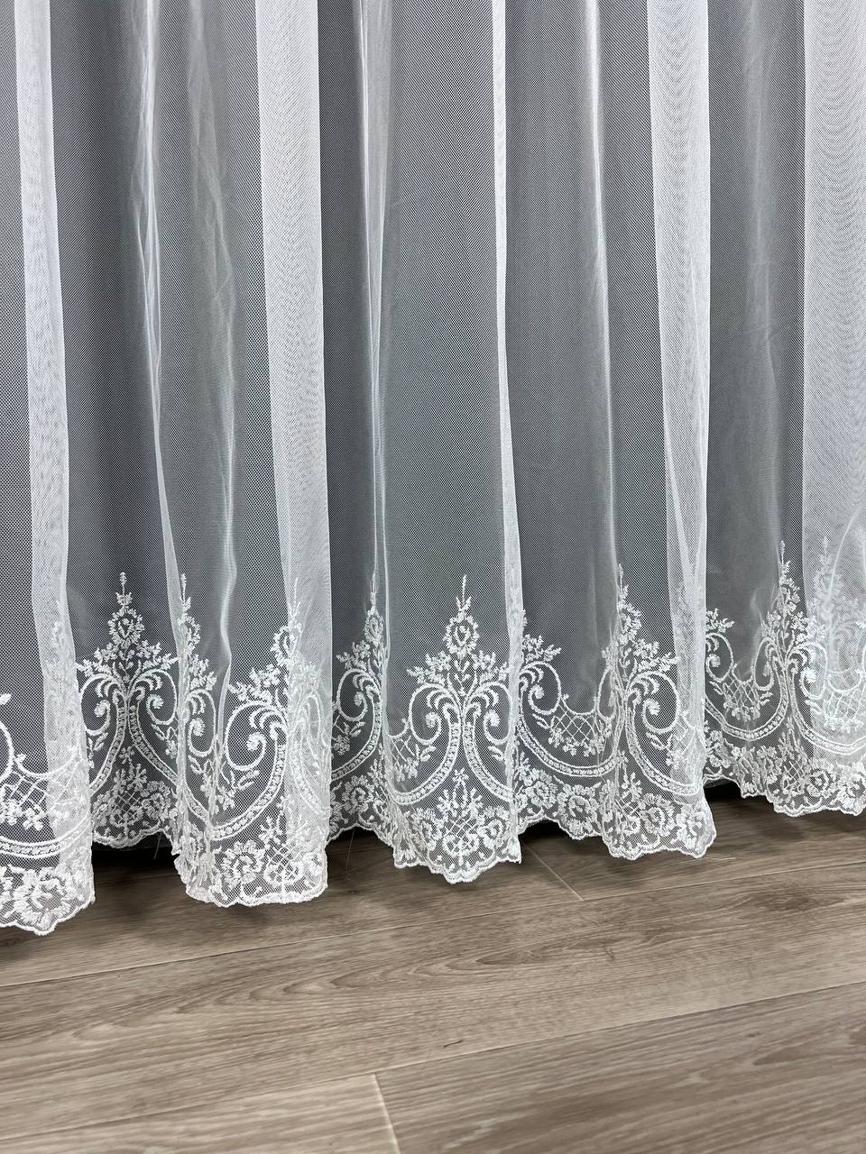 Sheer curtain with beautiful embroidery at the bottom, white color