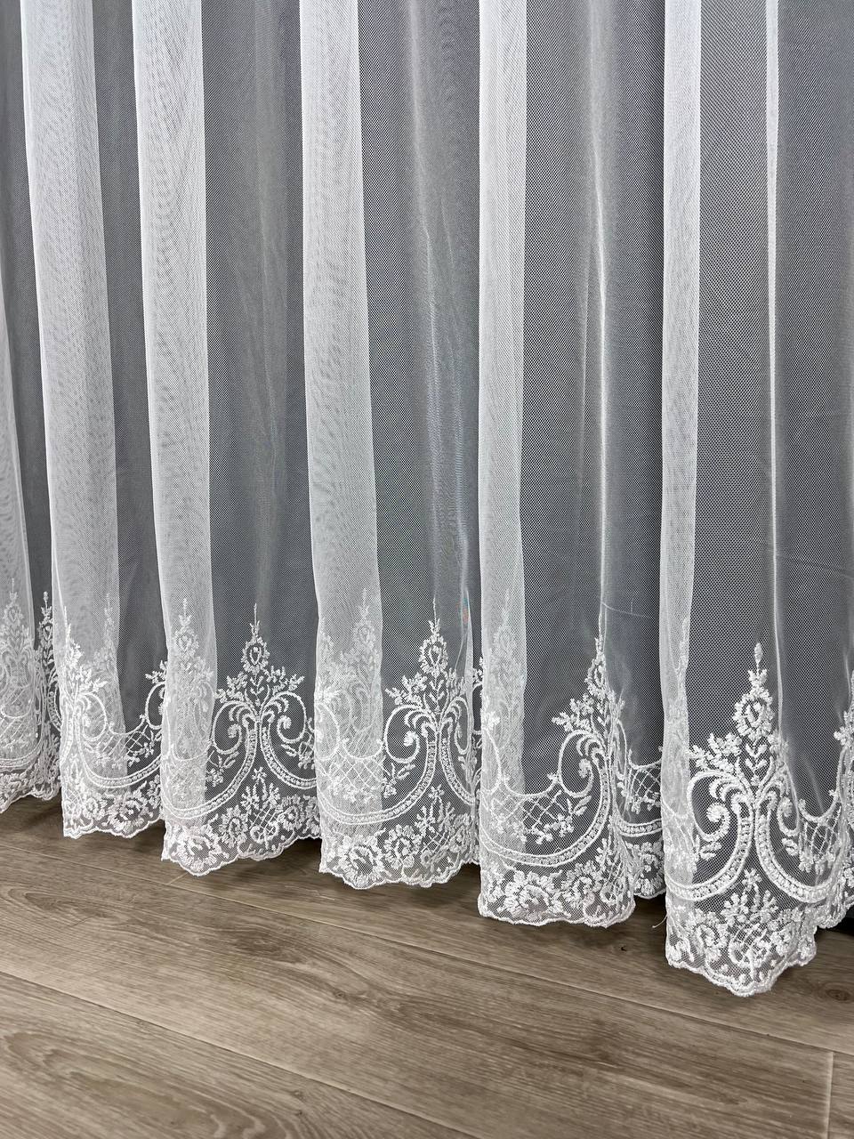 Sheer curtain with beautiful embroidery at the bottom, white color