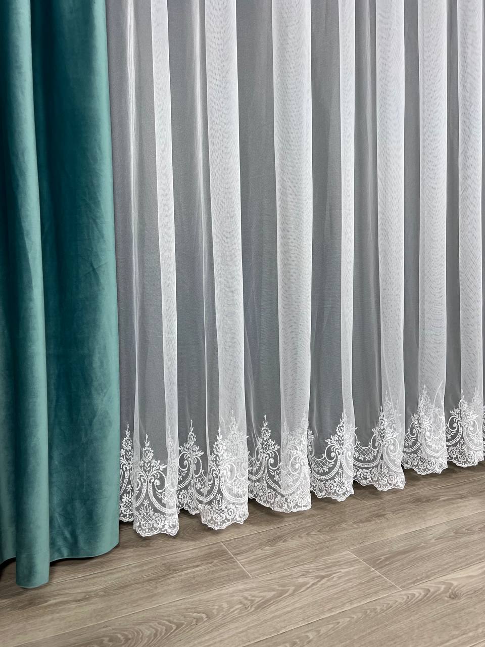 Sheer curtain with beautiful embroidery at the bottom, white color